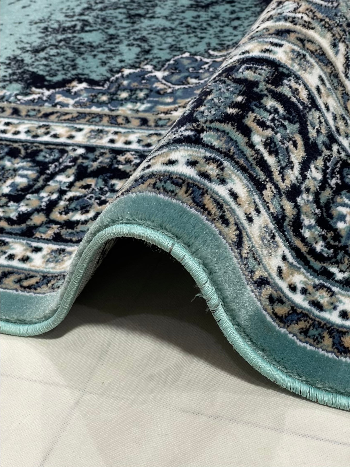 Persian polypropylene Rug,back woven(Article-23-Feroze)
Size: 6.6 ft width x 9.6 ft length (200cm x 290cm)