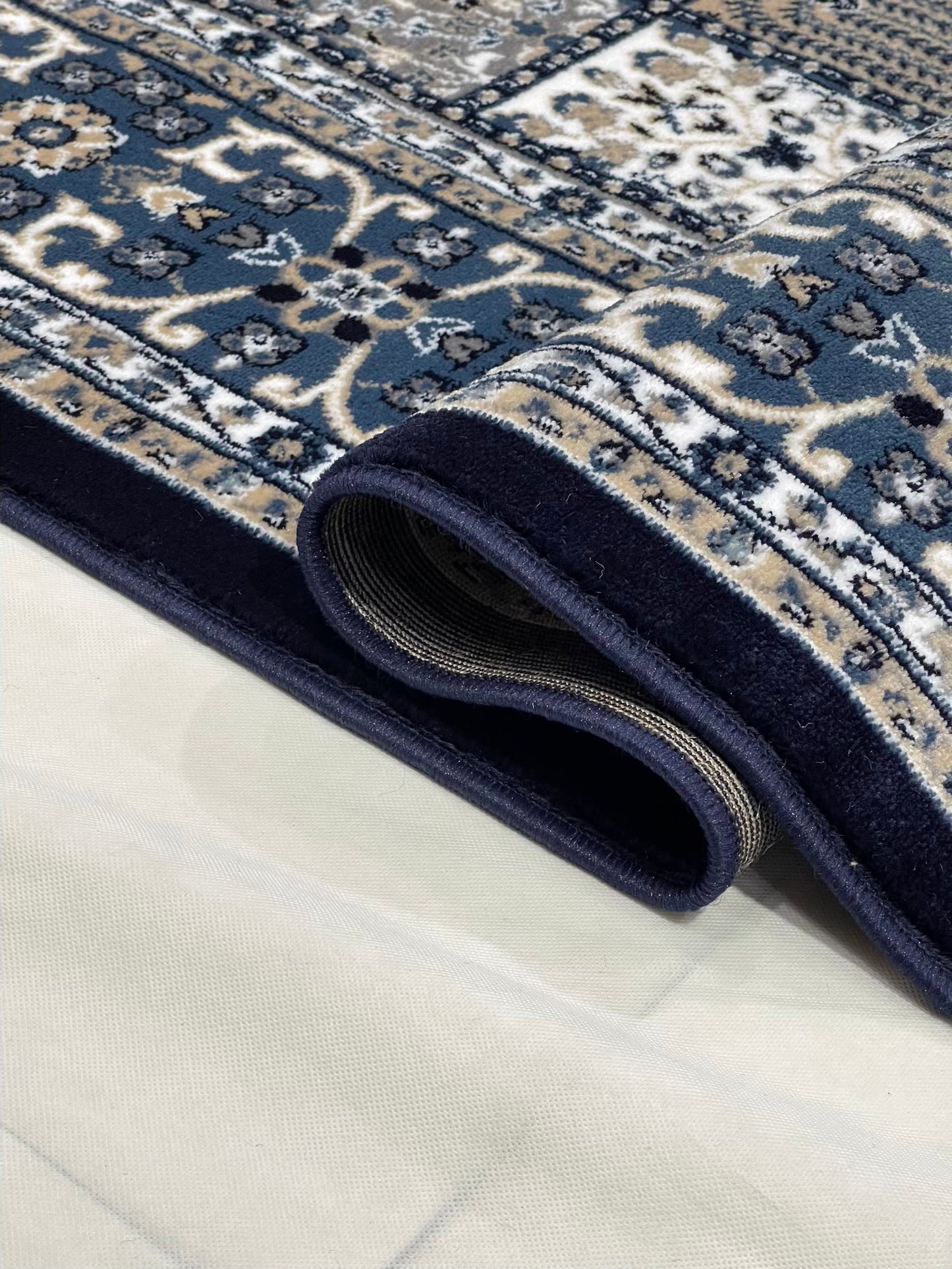 Persian polypropylene Rug,back woven(Article-42-Blue)
Size : 6.6 ft width x 9.6 ft length (200cm x 290cm)