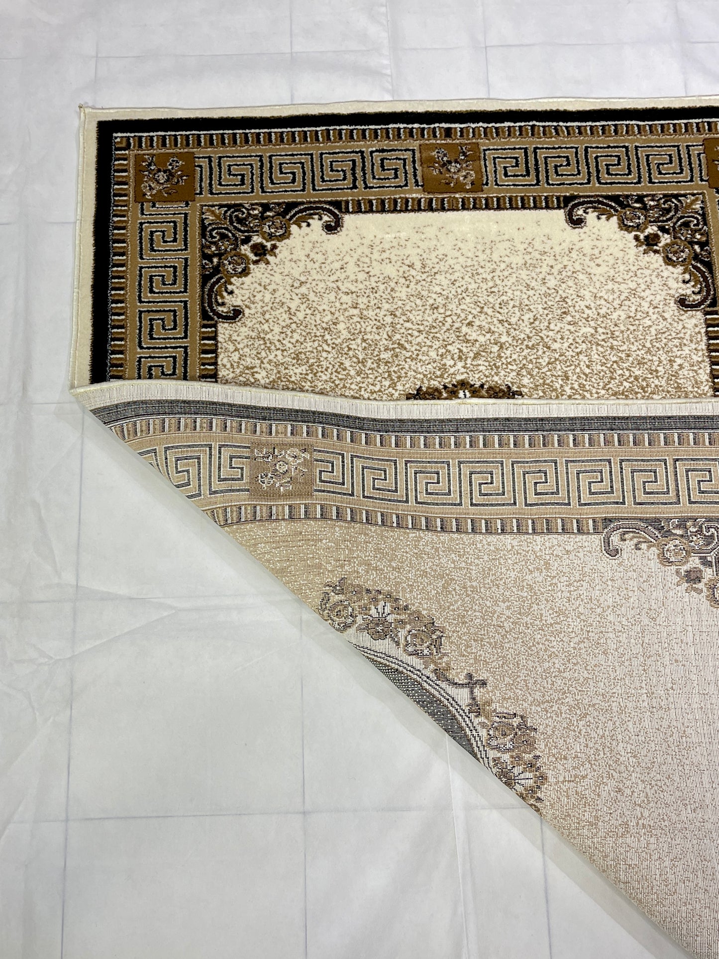 Versace Polypropylene Rug,back woven(Article-75-Off white)
Size : 5ft width x 7.3ft length (150cm x 220cm)