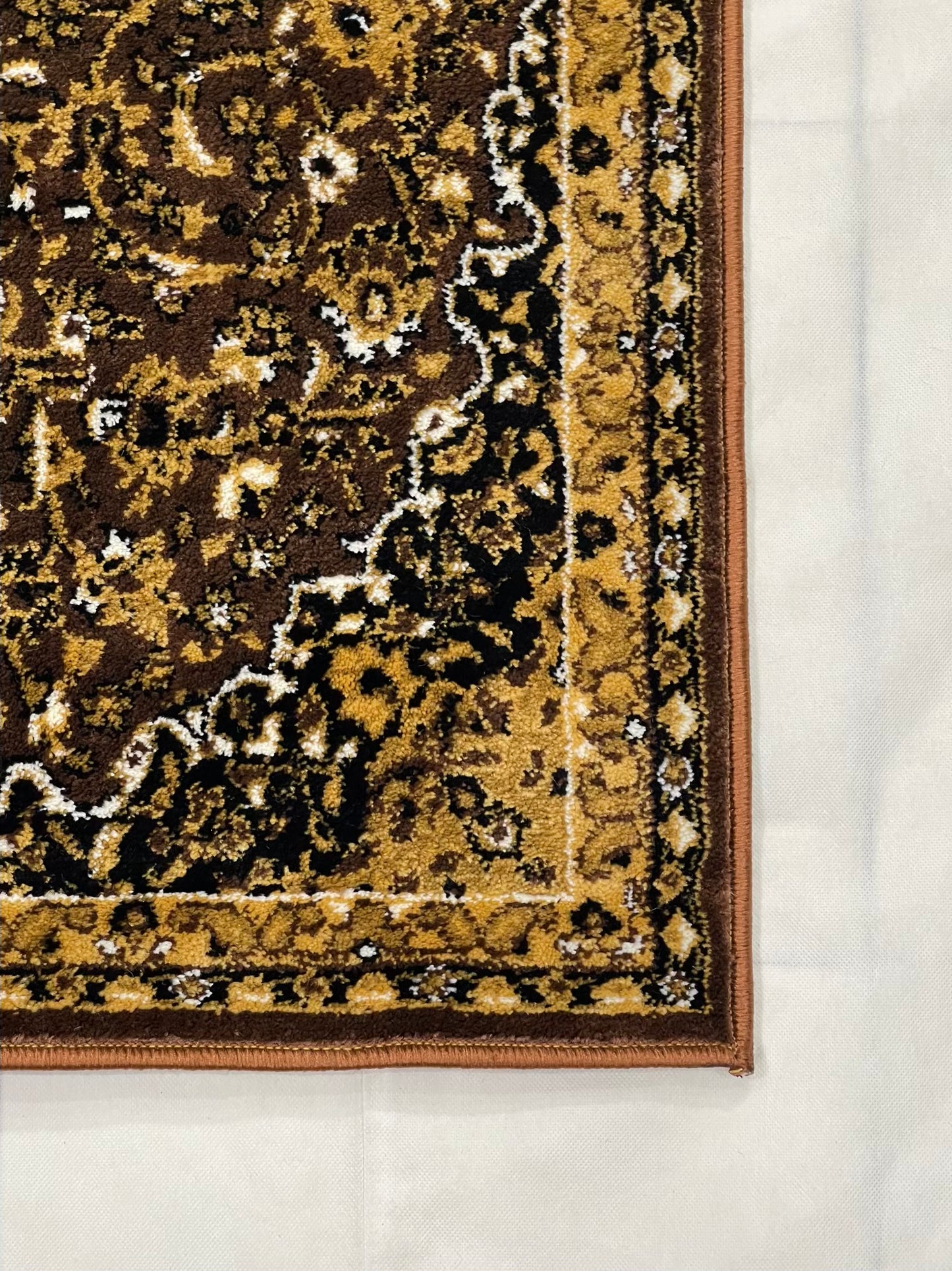 Persian Brown Polypropylene Woven Rug.
Size : 2.6 ft width x 6.3 ft length
(80 cm x 200cm)