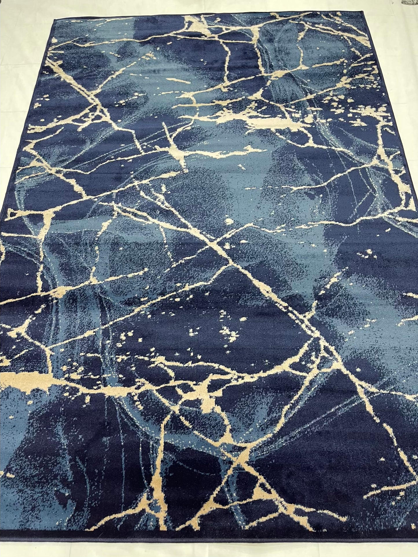 Modern polypropylene Rug,back woven(Article-3566-Blue)
Size : 6.6 ft width x 9.6 ft length (200cm x 290cm)