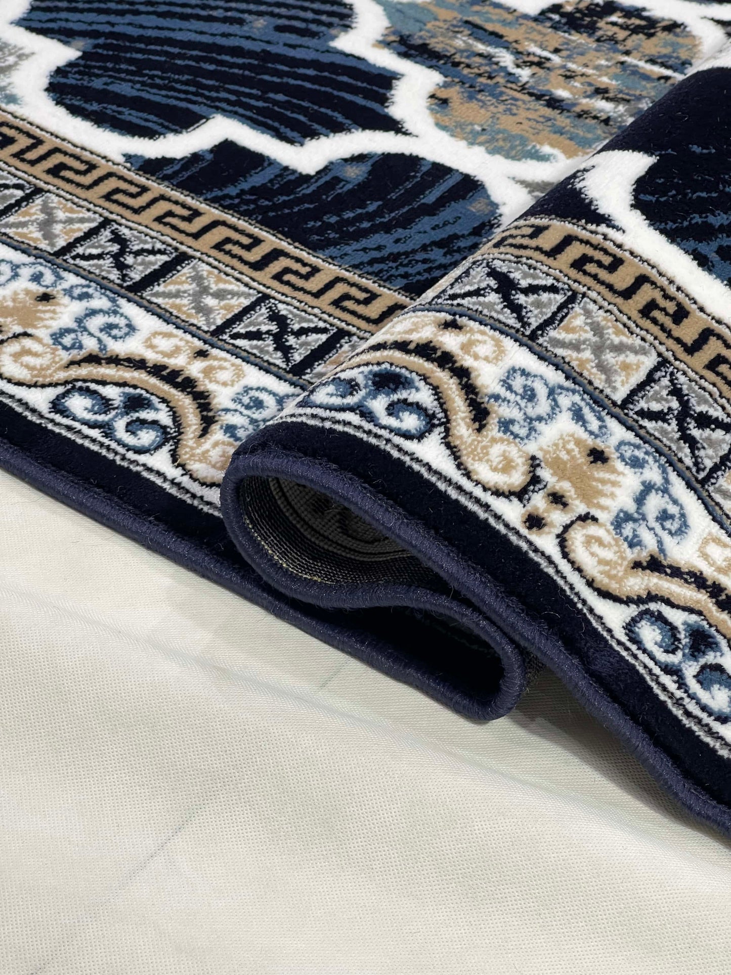 Modern polypropylene Rug,back woven(Article-5001-Blue)
Size : 6.6 ft width x 9.6 ft length (200cm x 290cm)