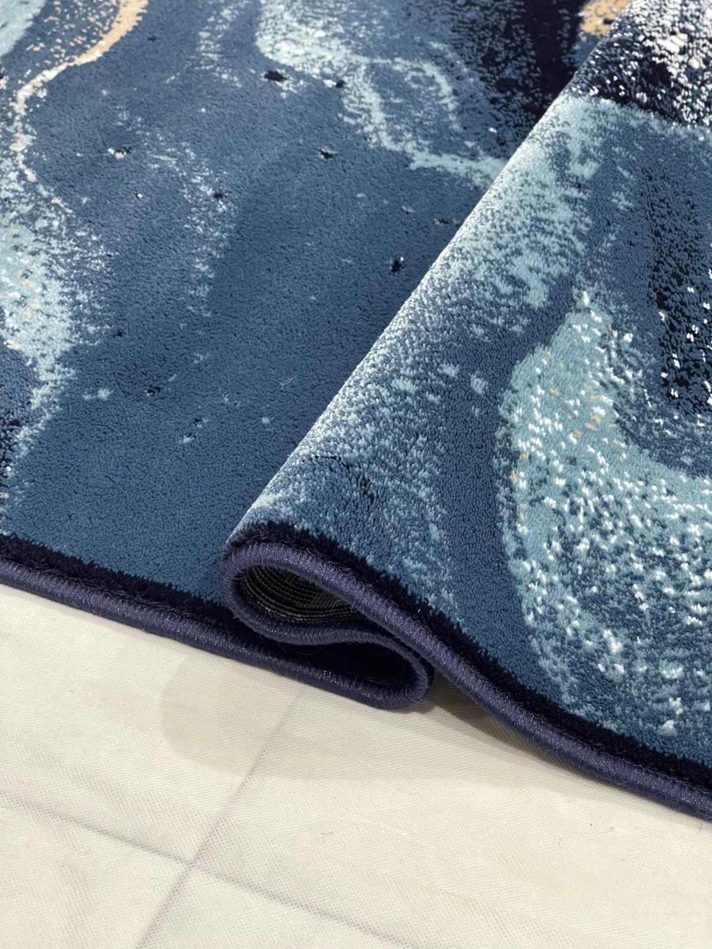Modern polypropylene Rug,back woven(Article-2221-Blue)
Size : 5ft width x 7.3ft length (150cm x 220cm)