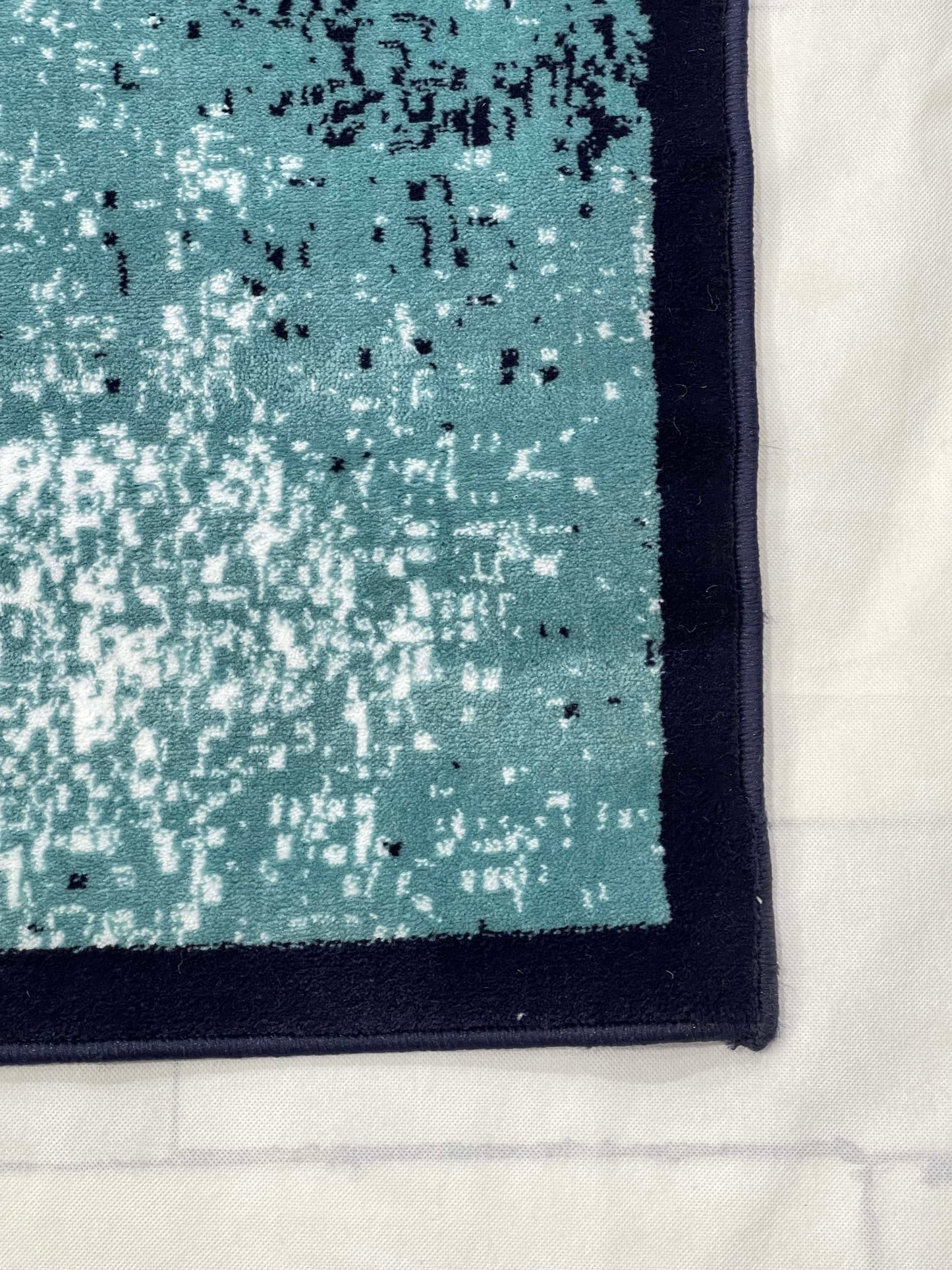 Modern polypropylene Rug,back woven(Article-7825-Blue)
Size : 6.6 ft width x 9.6 ft length (200cm x 290cm)