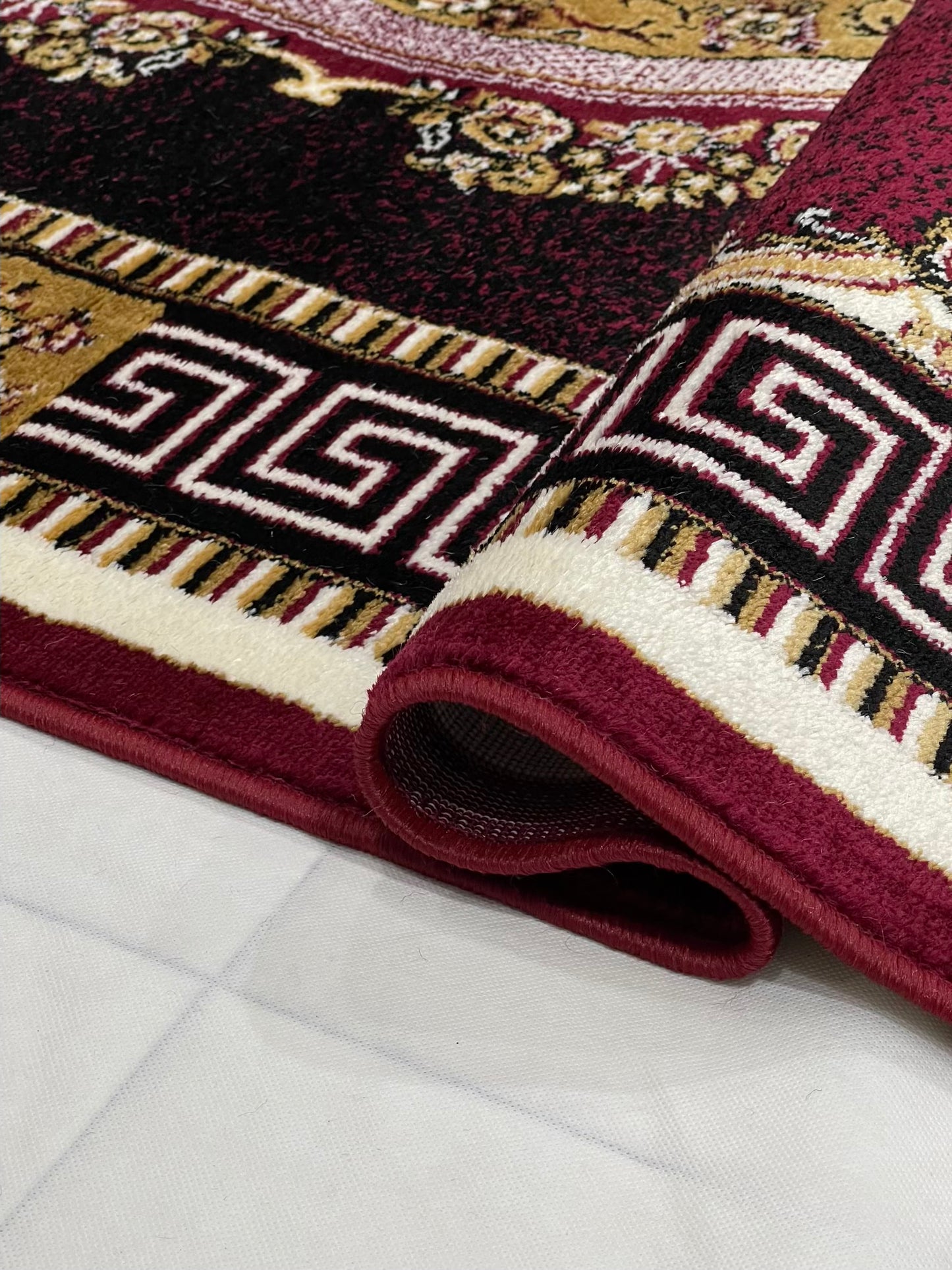 Versace Polypropylene woven Rug.
Article-75-Red
Size : 5ft width x 7.3ft length (150cm x 220cm)