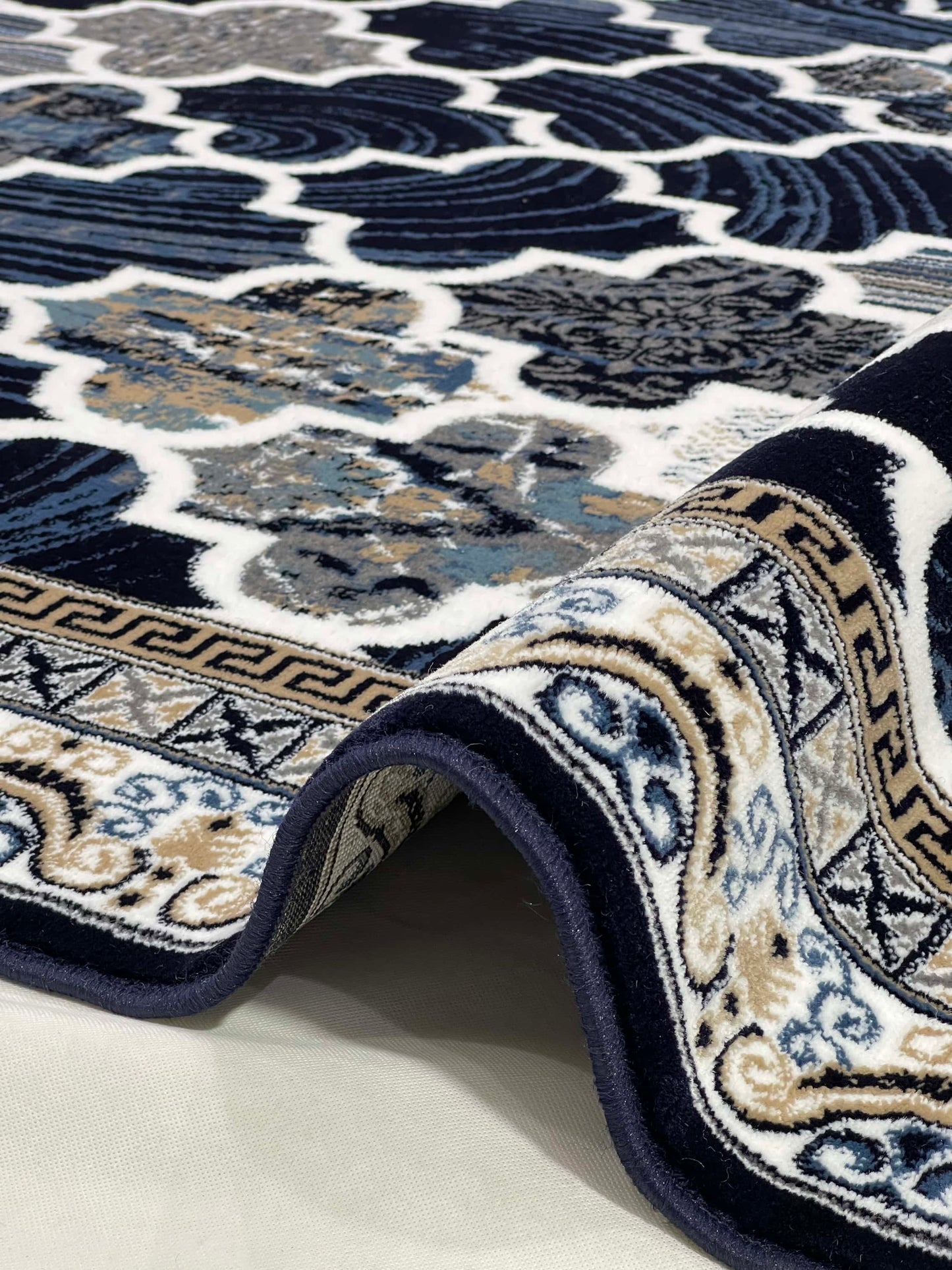 Modern polypropylene Rug,back woven(Article-5001-Blue)
Size : 6.6 ft width x 9.6 ft length (200cm x 290cm)