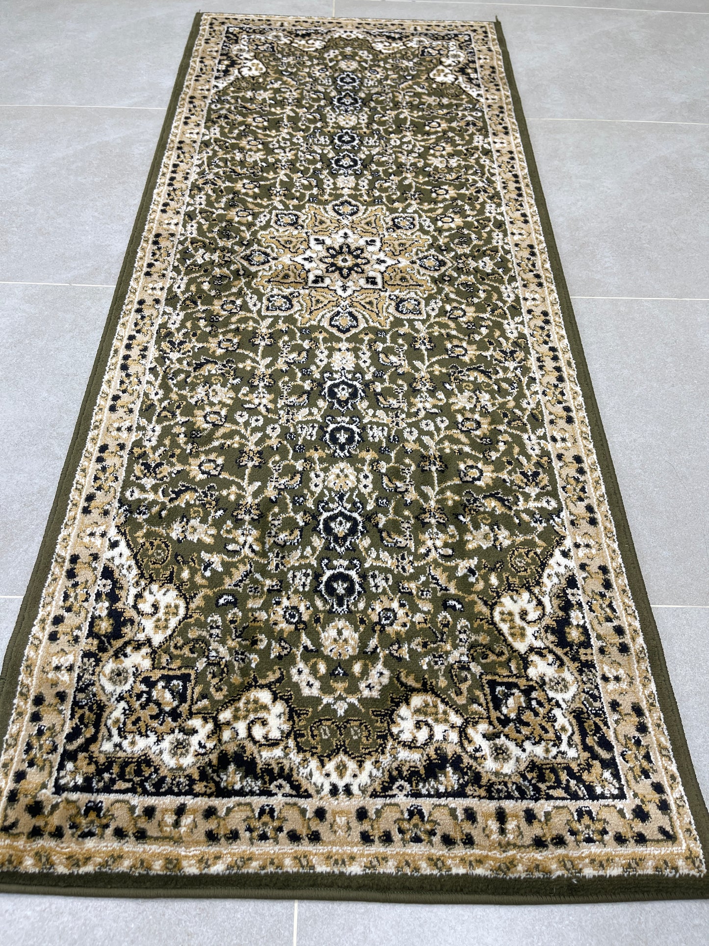 Green Persian Polypropylene Woven Rug.
Size : 2.6 ft width x 6.6 ft length
(80 cm x 200cm)