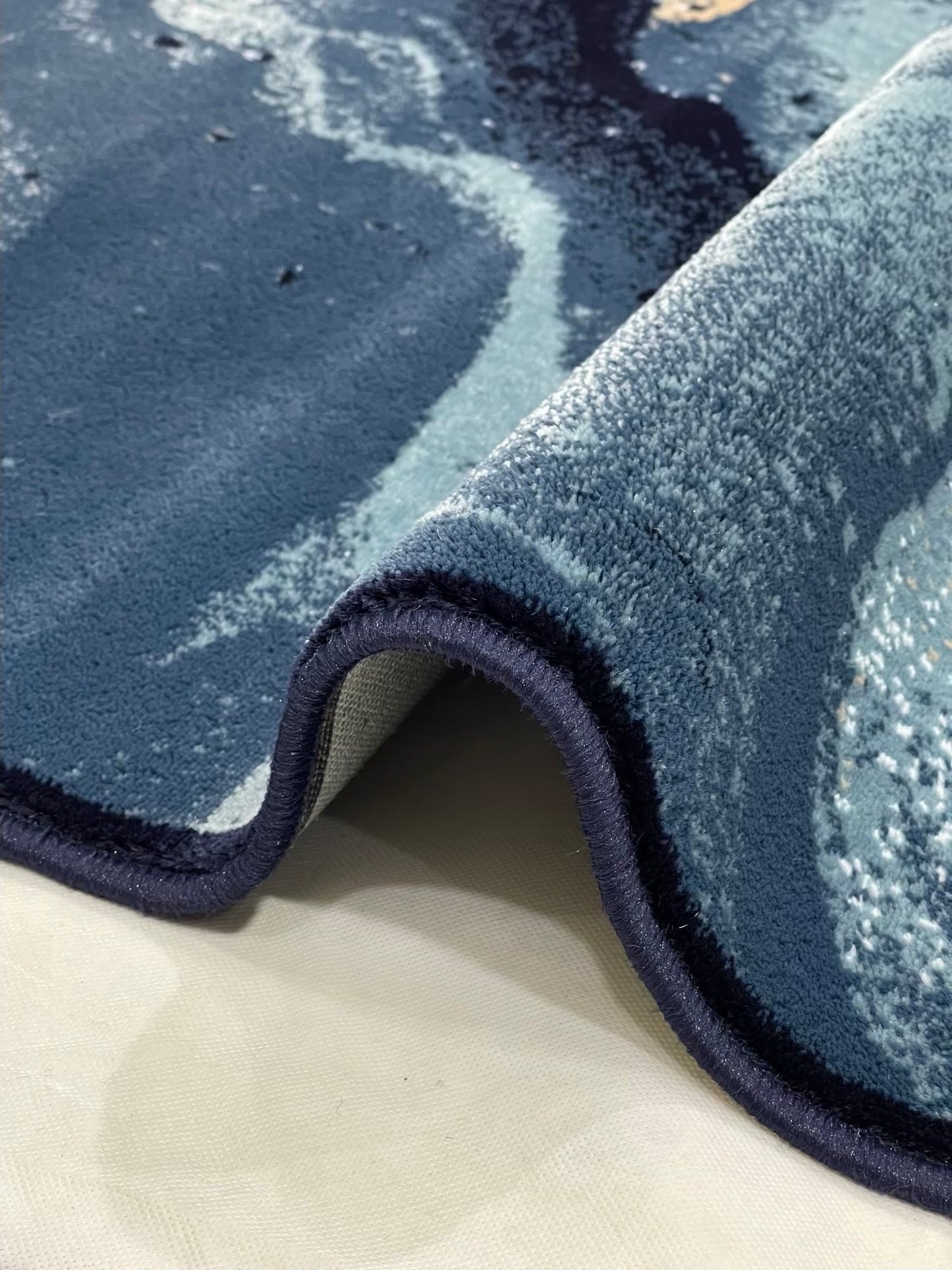Modern polypropylene Rug,back woven(Article-2221-Blue)
Size : 5ft width x 7.3ft length (150cm x 220cm)