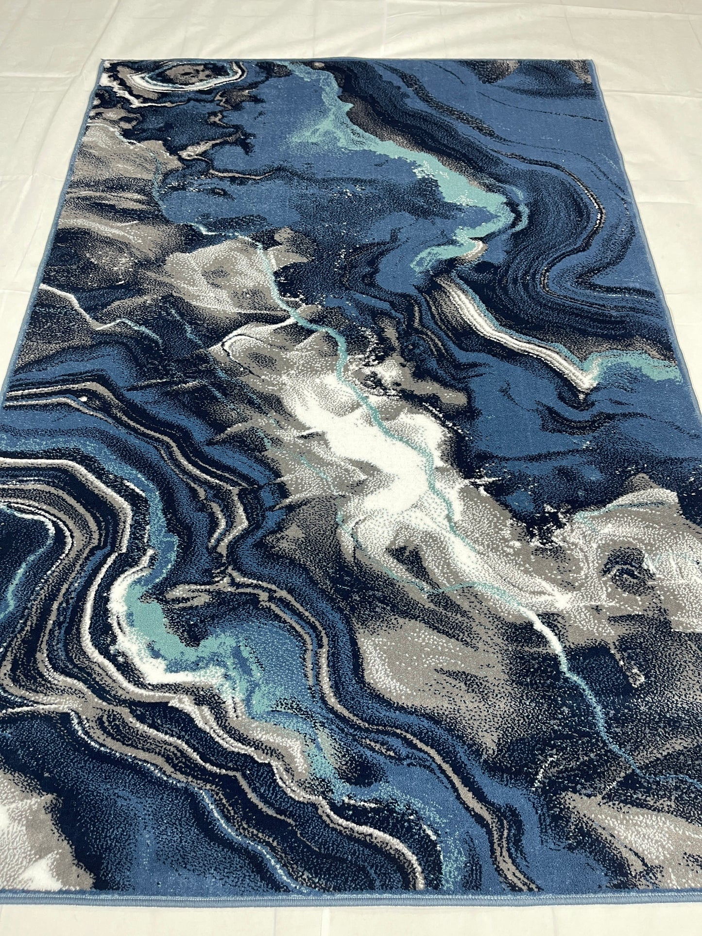 Modern polypropylene Rug,back woven(Article-6513-Blue)
Size : 5ft width x 7.3ft length (150cm x 220cm)