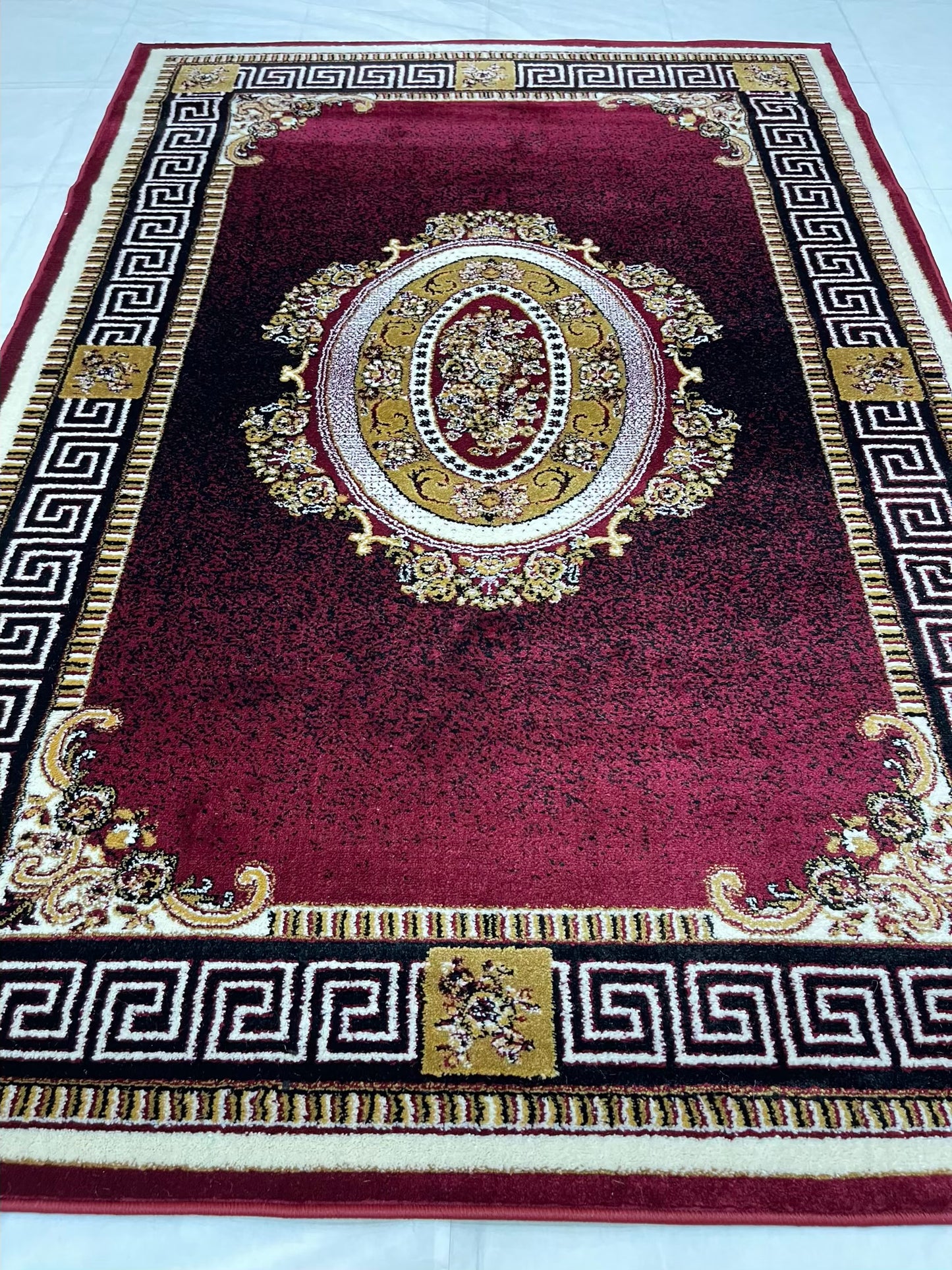 Versace Polypropylene woven Rug.
Article-75-Red
Size : 5ft width x 7.3ft length (150cm x 220cm)