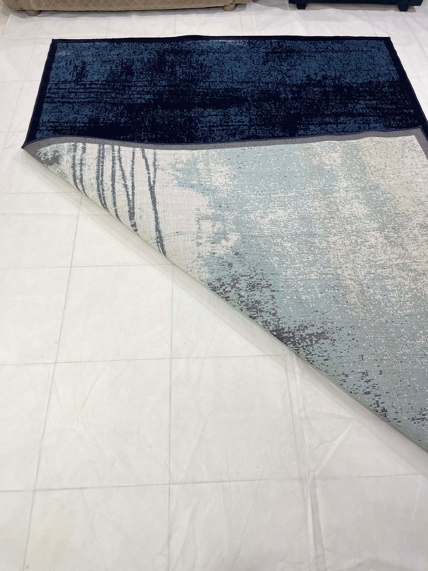 Modern polypropylene Rug,back woven(Article-7825-Blue)
Size : 6.6 ft width x 9.6 ft length (200cm x 290cm)