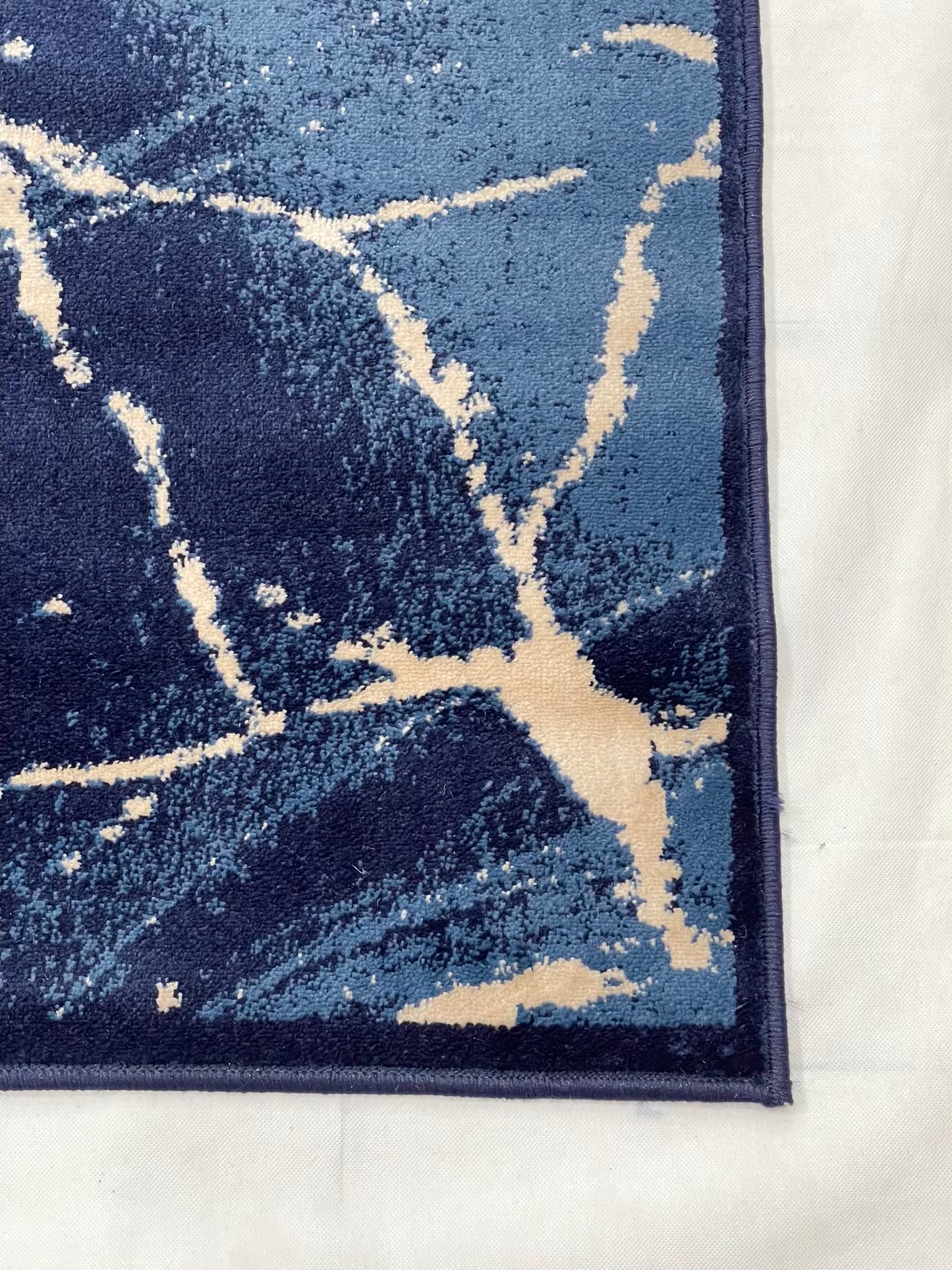 Modern polypropylene Rug,back woven(Article-3566-Blue)
Size : 6.6 ft width x 9.6 ft length (200cm x 290cm)