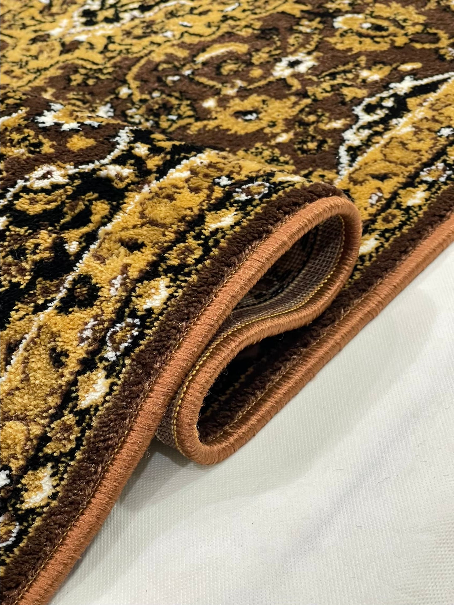 Persian Brown Polypropylene Woven Rug.
 Size : 2.6 ft width x 6.3 ft length
 (80 cm x 200cm)