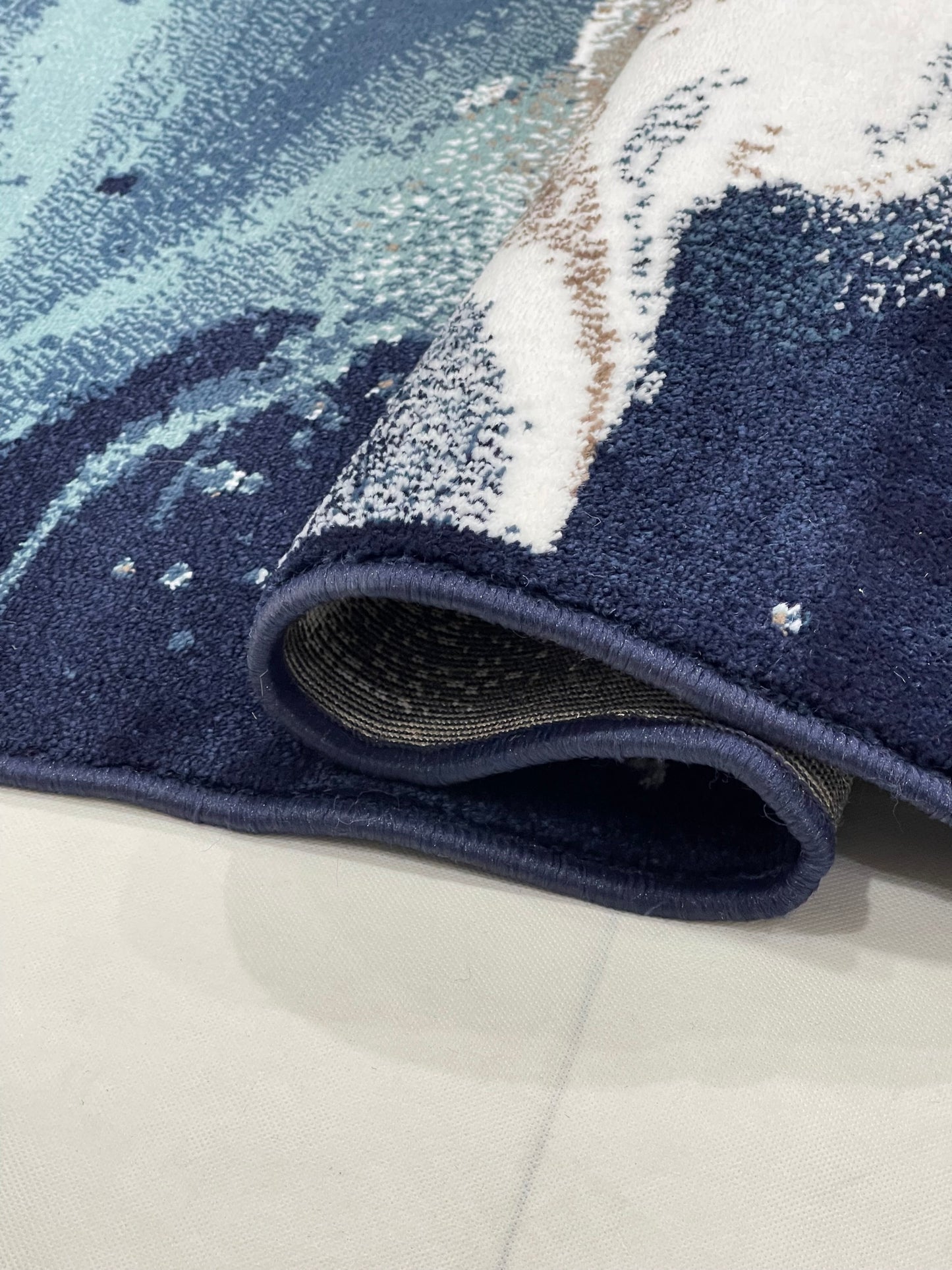 Modern polypropylene Rug,back woven(Article-160- Blue)
Size : 6.6 ft width x 9.6 ft length (200cm x 290cm)