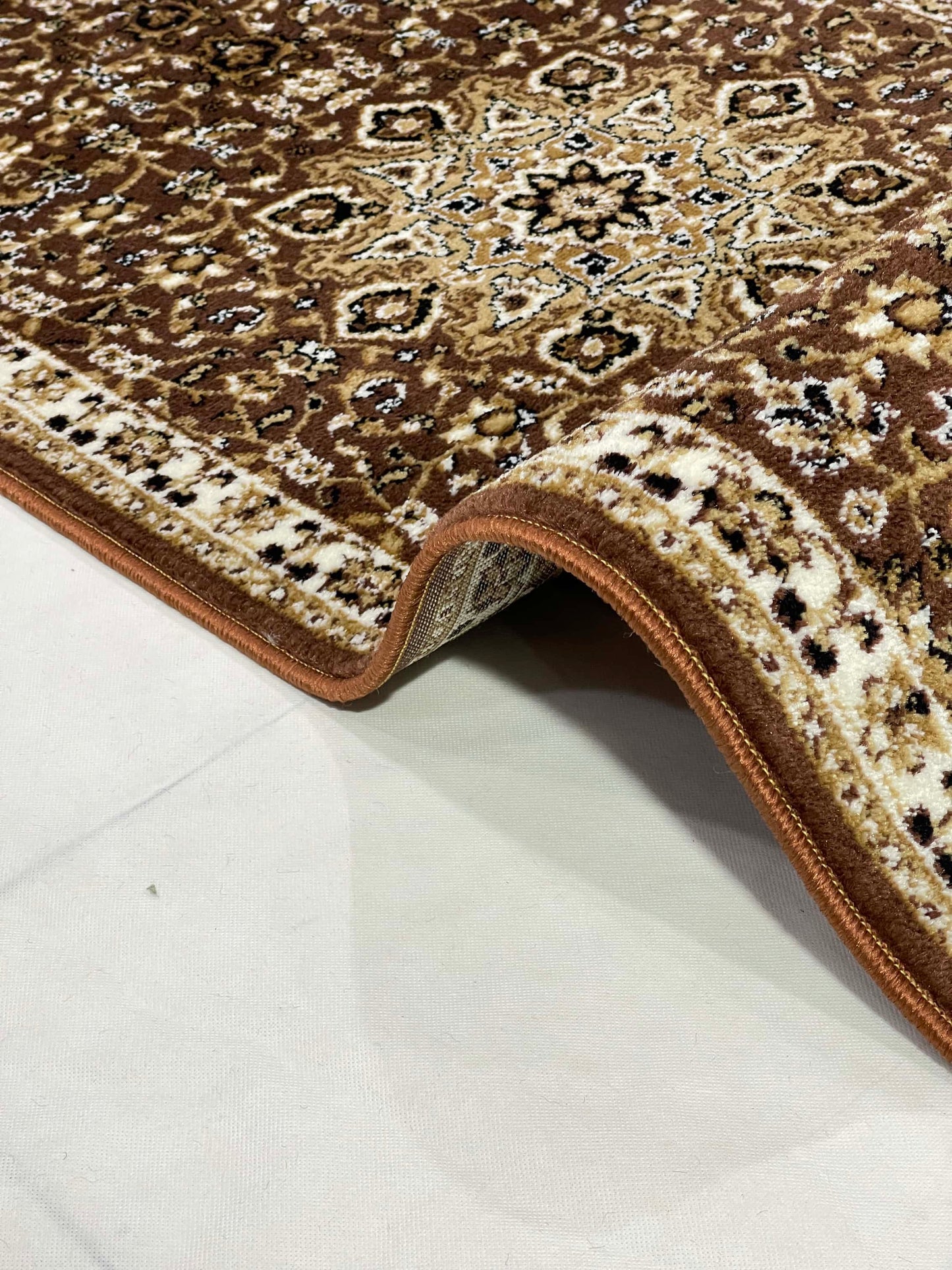 Brown Persian Polypropylene Woven Runner.
Size : 2.6 ft width x 6.6 ft length
(80 cm x 200 cm)