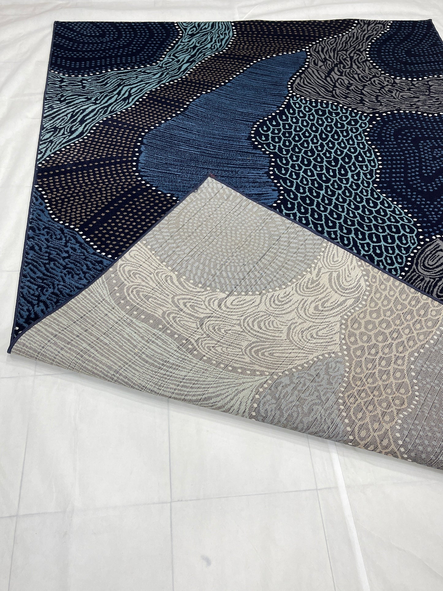 Modern polypropylene Rug,back woven(Article-125-Blue)
Size : 6.6 ft width x 9.6 ft length (200cm x 290cm)