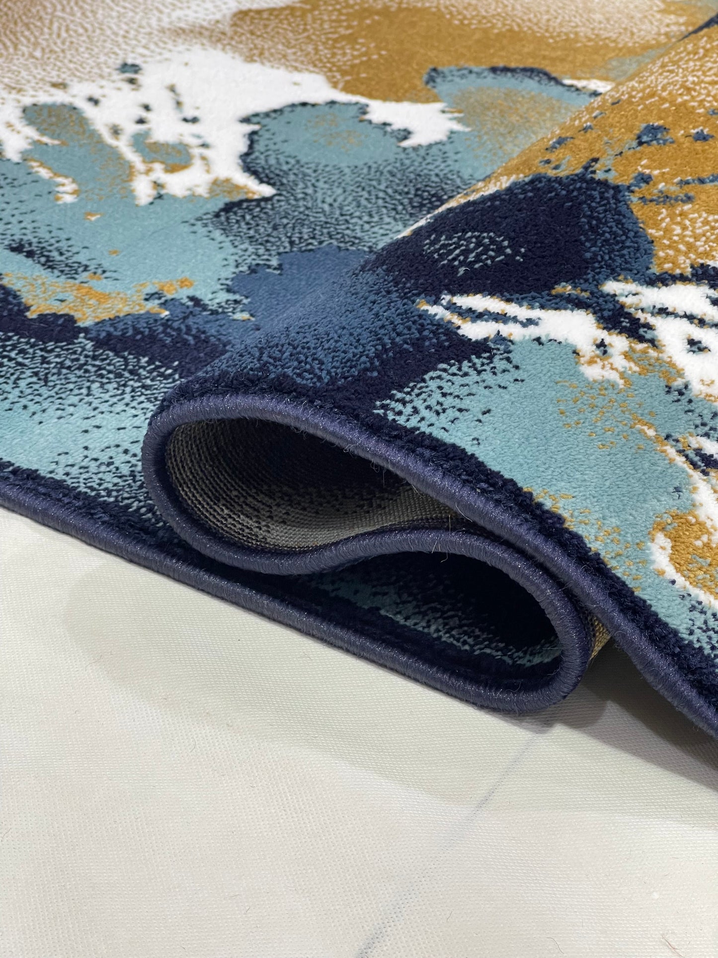 Modern polypropylene Rug,back woven.
(Article-1777-Blue) 
Size : 5 ft width x 7.3 ft length ( 150 cm x 220 cm)