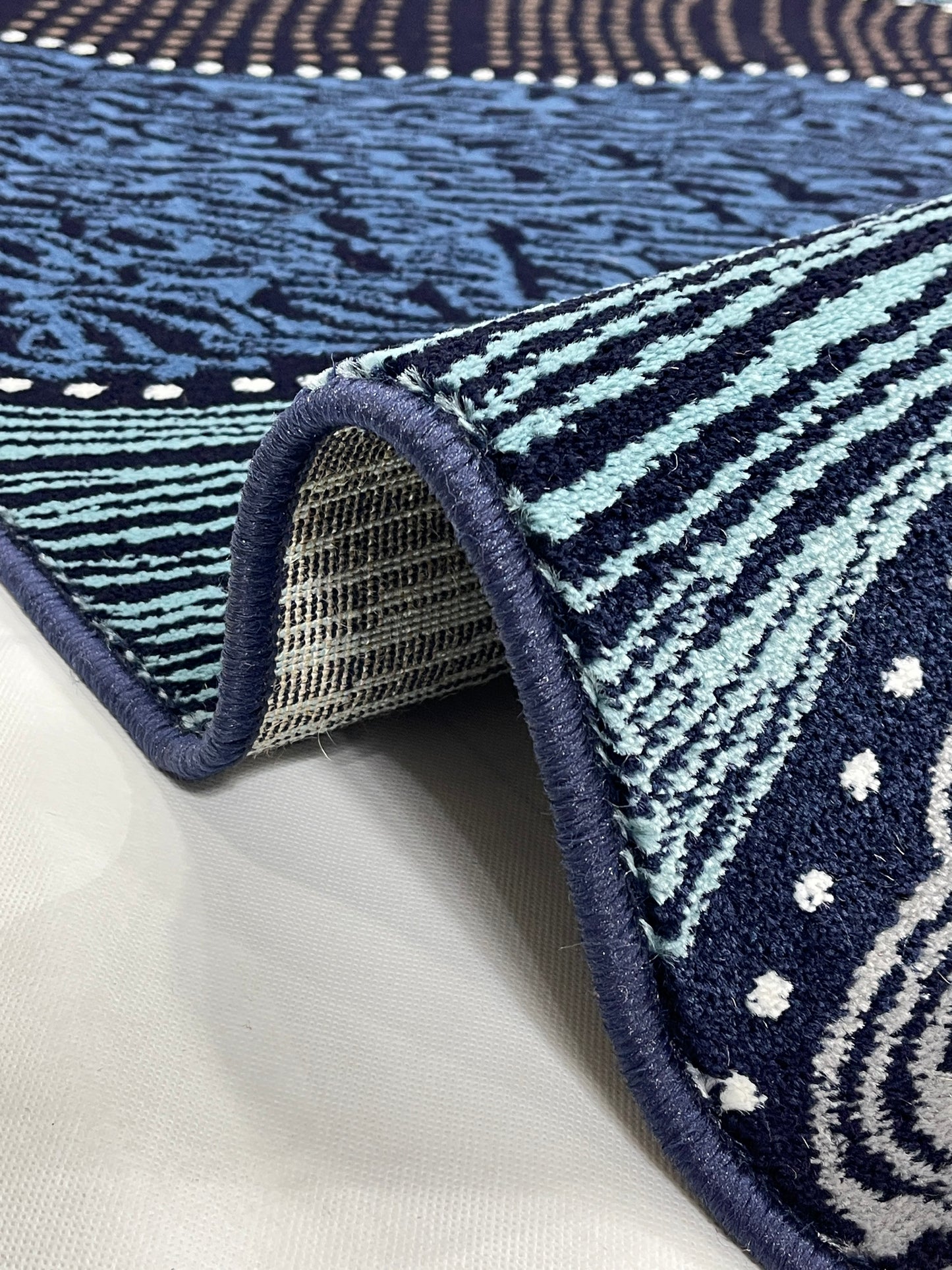 Modern polypropylene Rug,back woven(Article-125-Blue)
Size : 6.6 ft width x 9.6 ft length (200cm x 290cm)