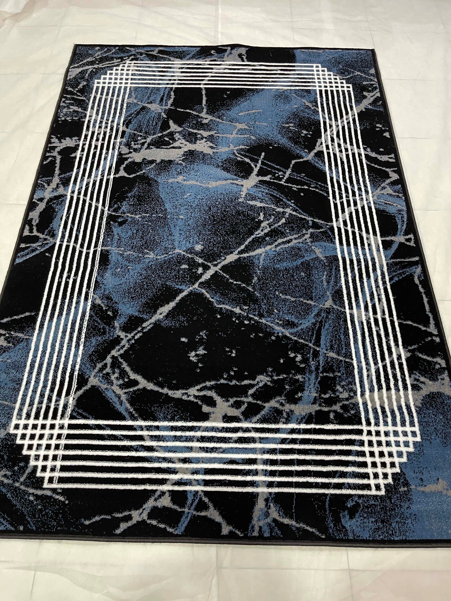 Modern polypropylene Rug,back woven(Article-872-Black,Blue)
Size : 5ft width  x 7.3ft length (150cm x 220cm)