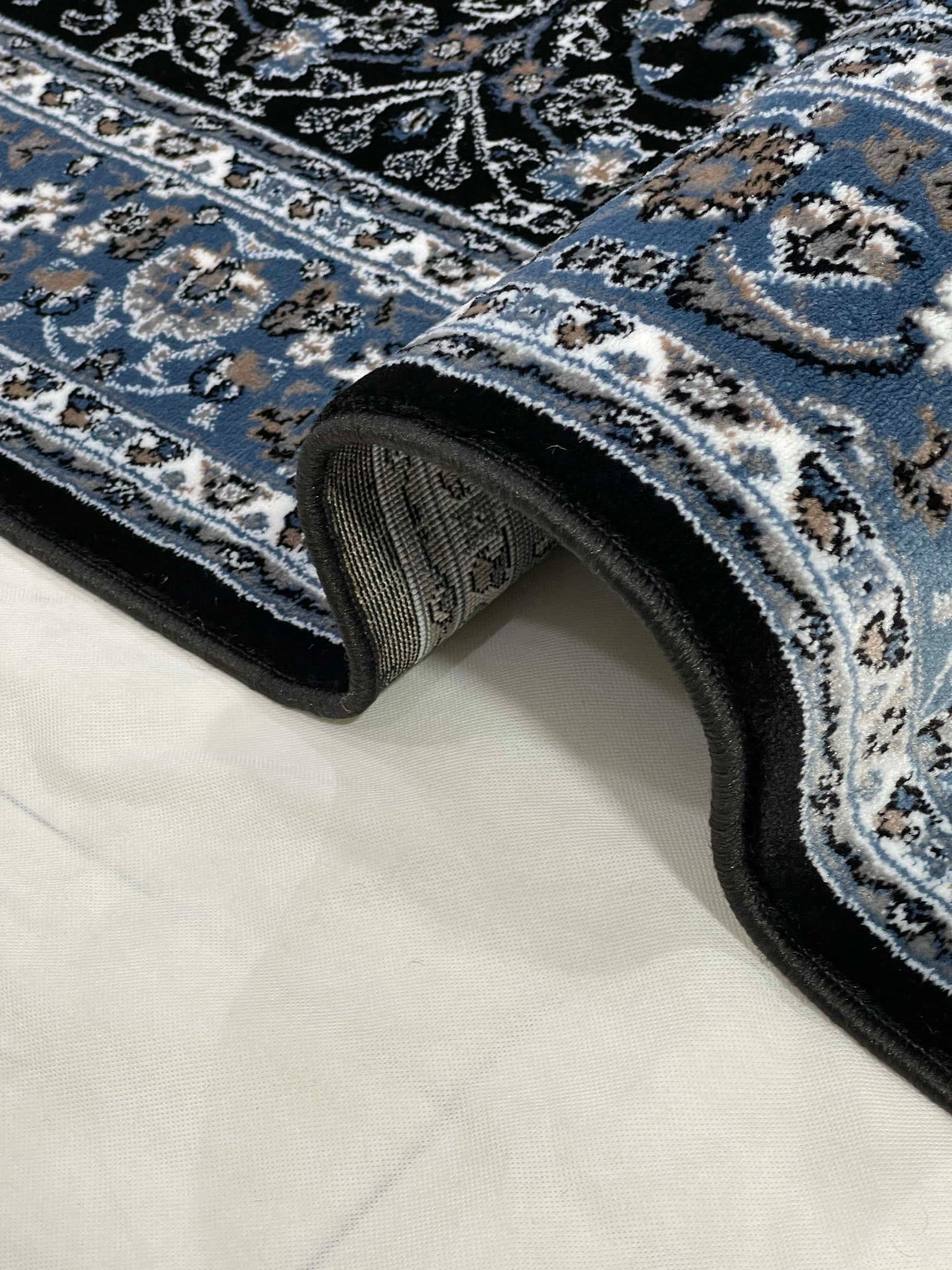 Persian Polypropylene Rug,back woven(Article-25-Black, Blue )
Size : 5ft width  x 7.3ft length (150cm x 220cm)