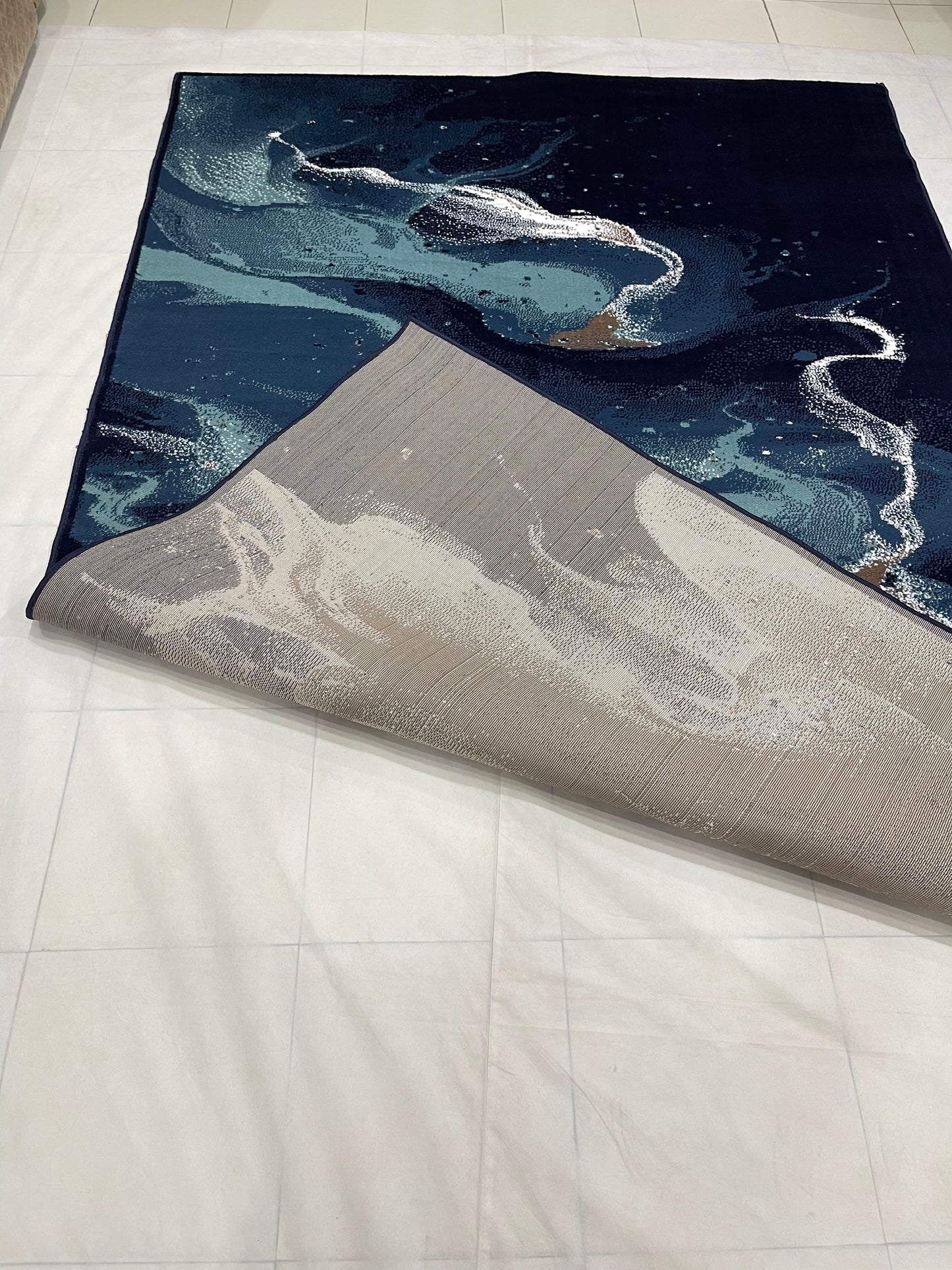 Modern polypropylene Rug,back woven(Article-160- Blue)
Size : 6.6 ft width x 9.6 ft length (200cm x 290cm)