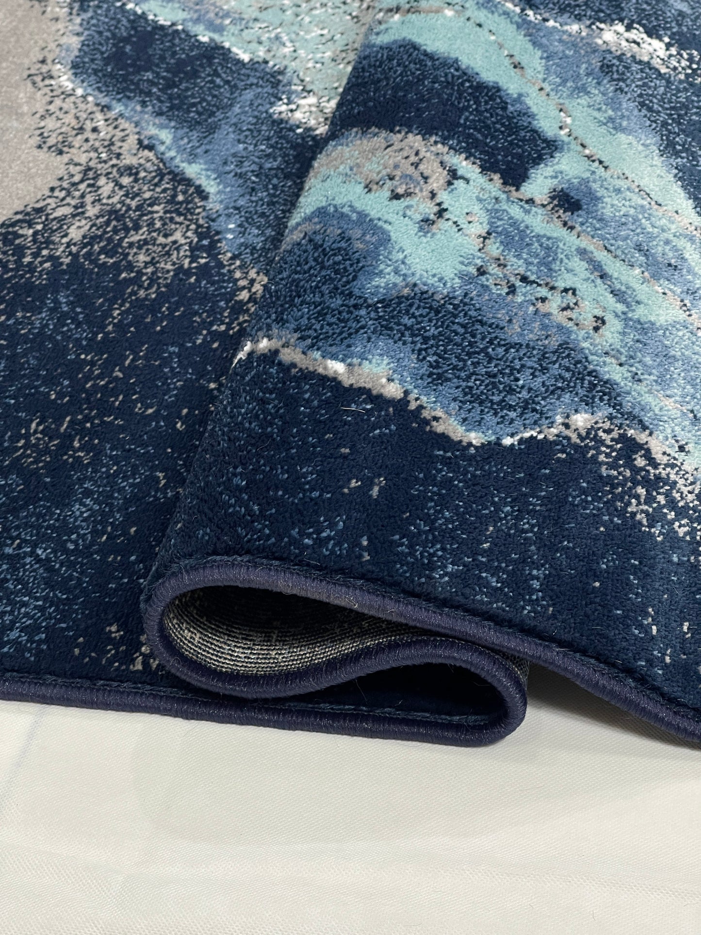 Modern polypropylene Rug,back woven(Article-5444-Blue)
Size : 5ft width  x 7.3ft length (150cm x 220cm)