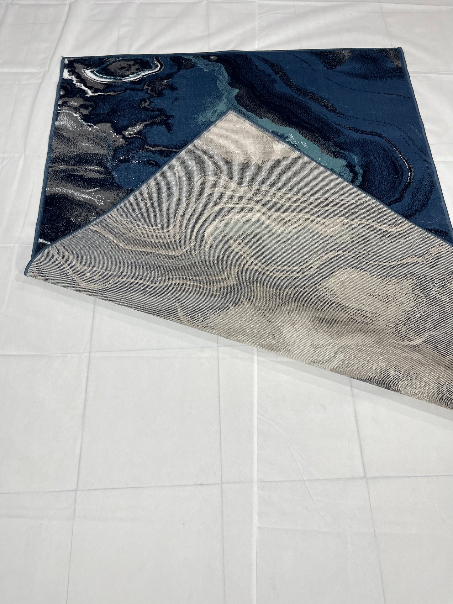 Modern polypropylene Rug,back woven(Article-6513-Blue)
Size : 5ft width  x 7.3ft length (150cm x 220cm)