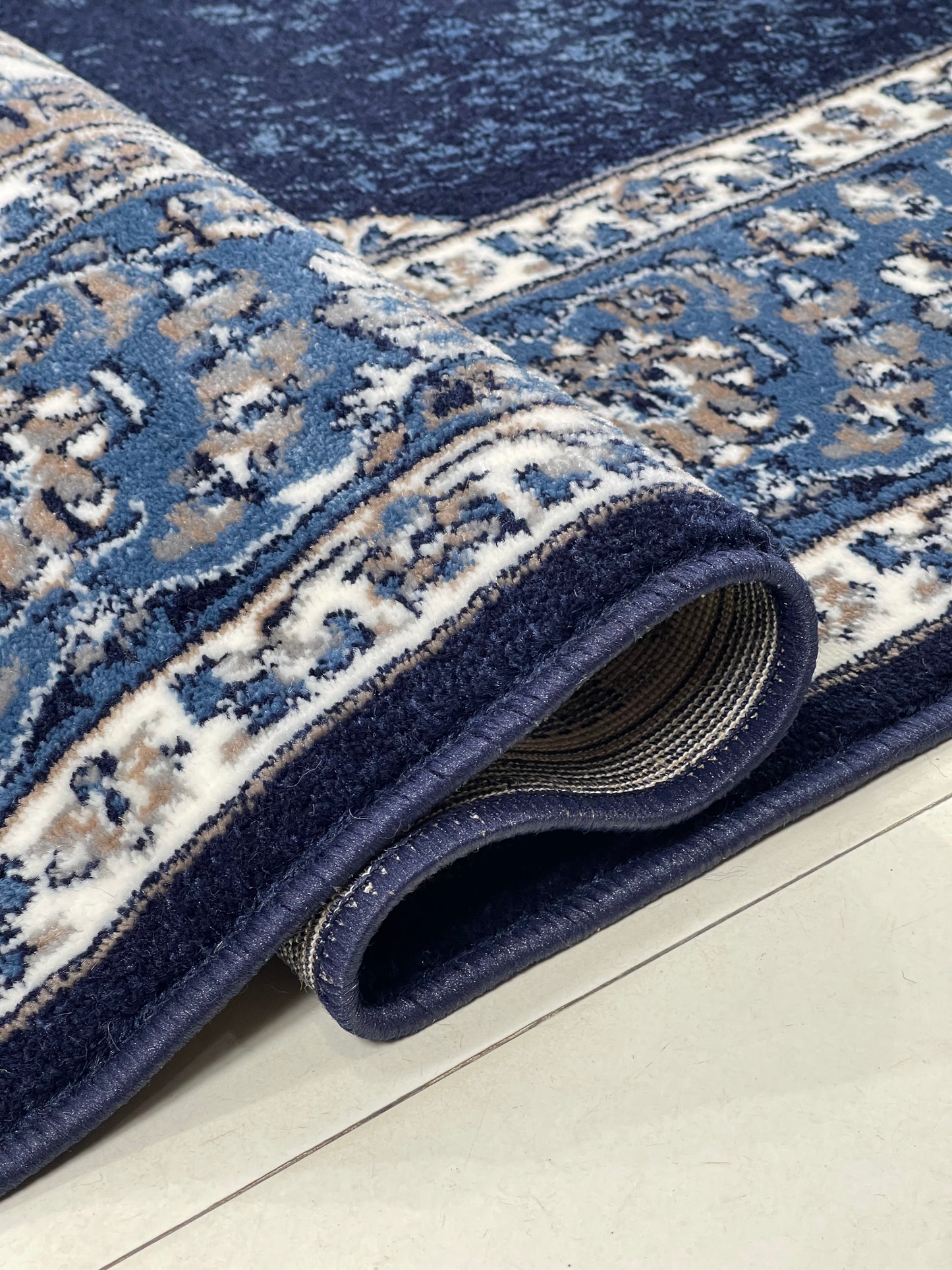 Persian polypropylene Rug,back woven(Article-42-Dark Blue)
Size : 6.6 ft width x 9.6 ft length (200cm x 290cm)