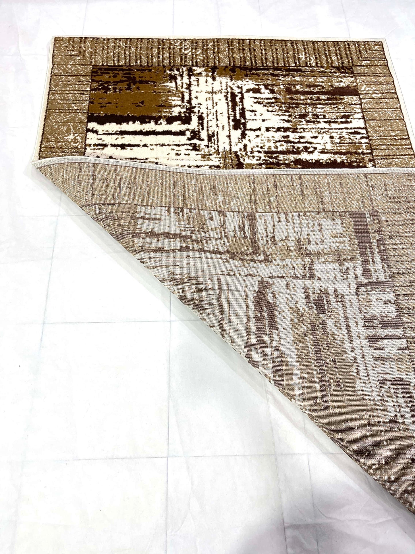 Modern polypropylene Rug,back woven(Article-1788-Off white )
Size : 4 ft width x 5.6 ft length ( 120 cm x 170 cm)