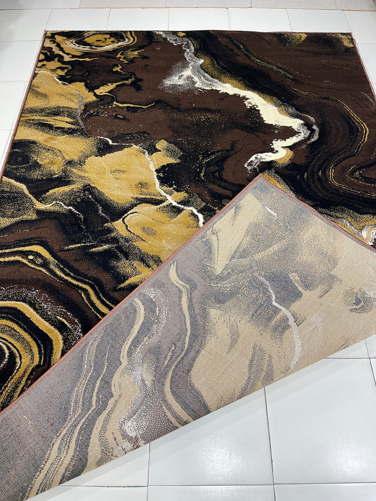 Modern polypropylene Rug,back woven(Article-422-Brown)
Size : 6.6 ft width x 9.6 ft length (200cm x 290cm)