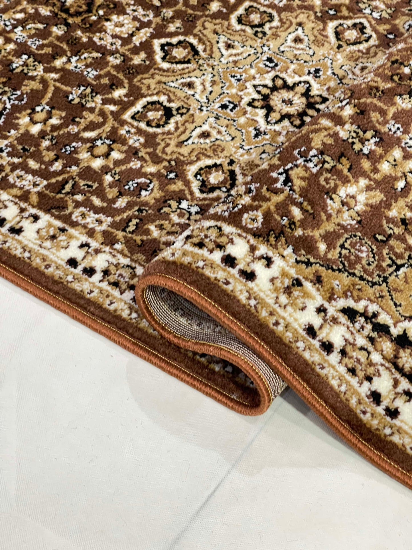 Brown Persian Polypropylene Woven Runner.
Size : 2.6 ft width x 6.6 ft length
(80 cm x 200 cm)