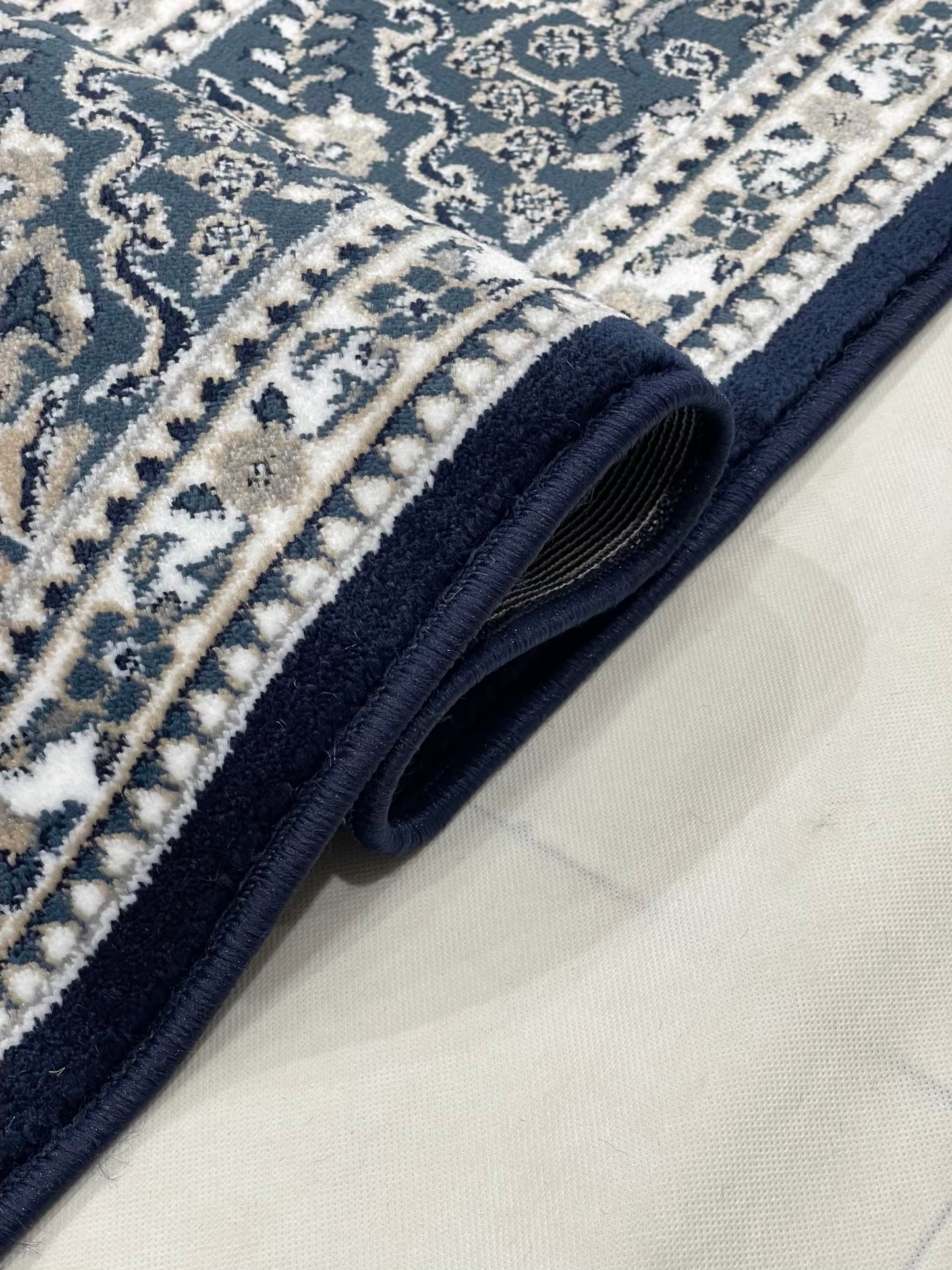 Persian polypropylene Rug,back woven(Article-22-Blue)
Size : 6.6 ft width x 9.6 ft length (200cm x 290cm)