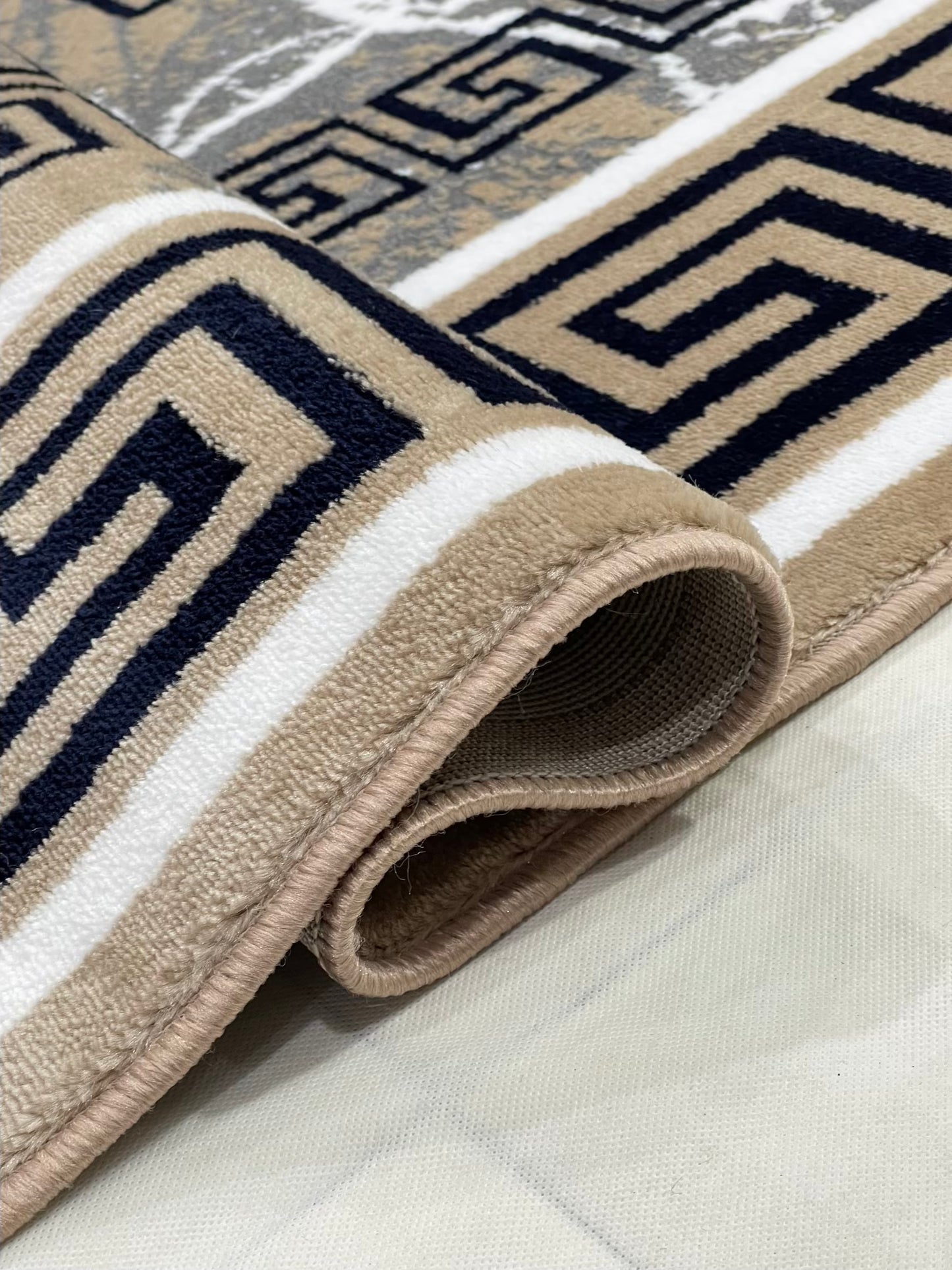 Versace  Polypropylene woven Rug.
Article-1299-Mink
Size : 5ft width  x 7.3ft length (150cm x 220cm)