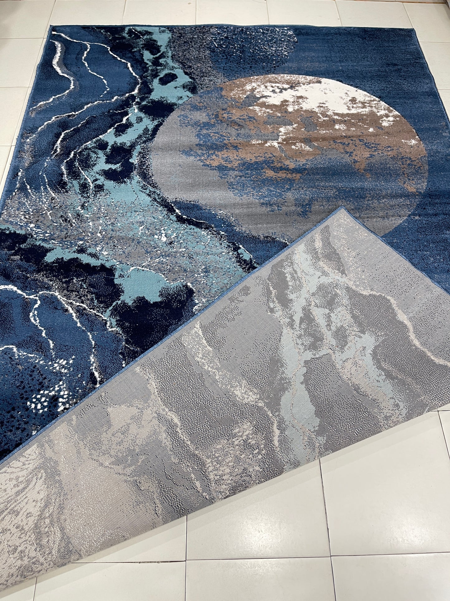Modern polypropylene Rug,back woven(Article-429-Blue)
Size : 6.6 ft width x 9.6 ft length (200cm x 290cm)