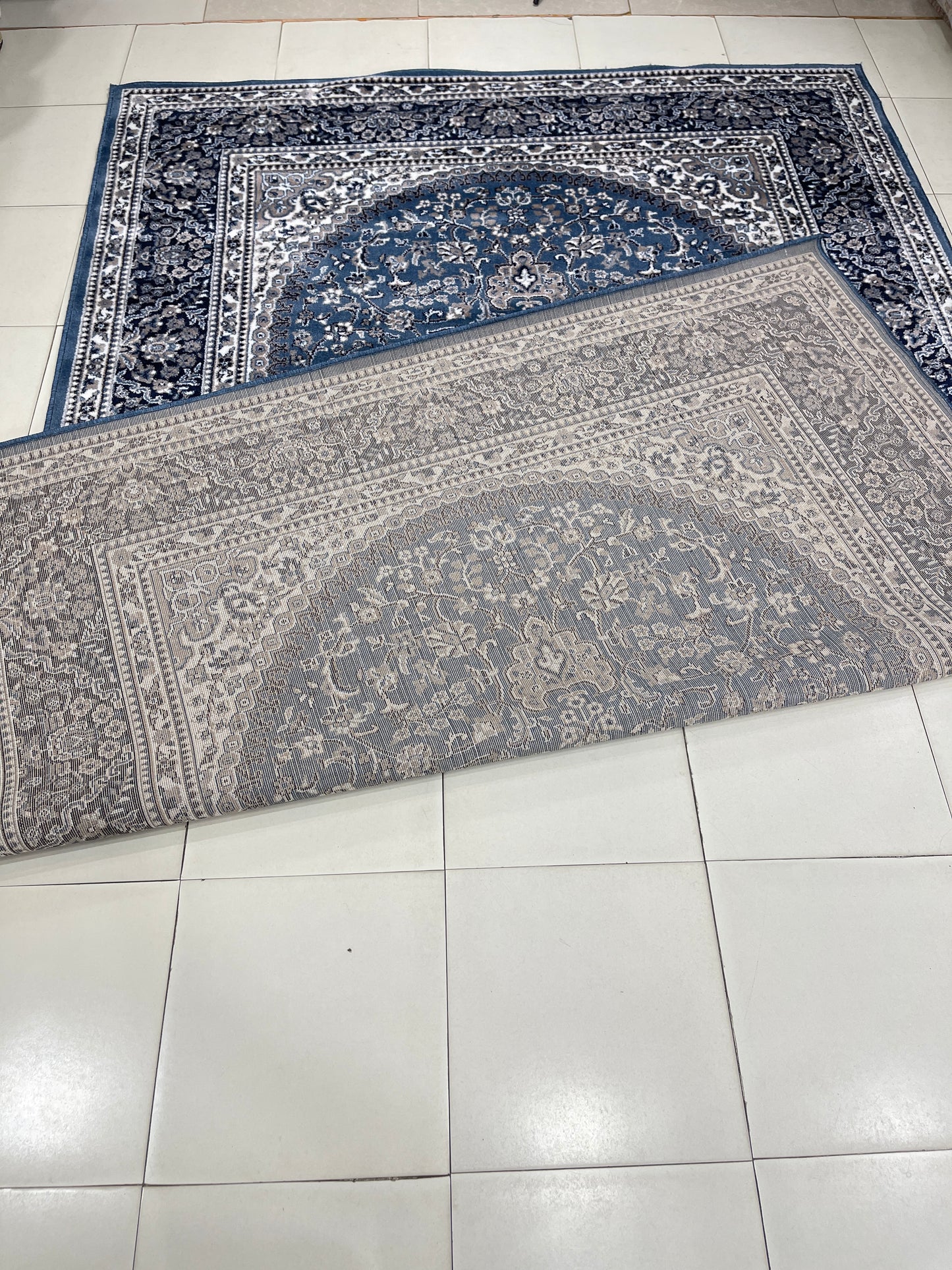 Persian polypropylene Rug,back woven(Article-22-Blue)
Size : 6.6 ft width x 9.6 ft length (200cm x 290cm)