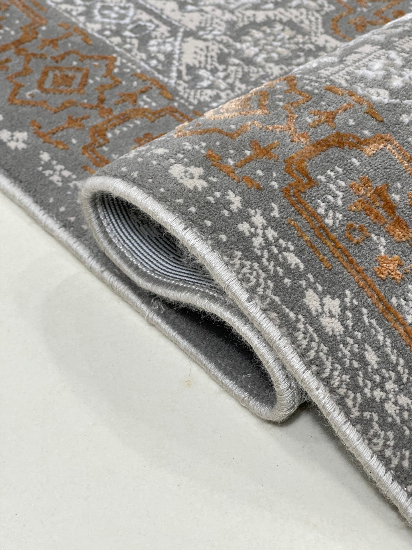 Irani viscose Rug , Woven Back
Article-324-Grey, Rust
Size : 3 ft width x 5 ft length (100 cm x 150cm)