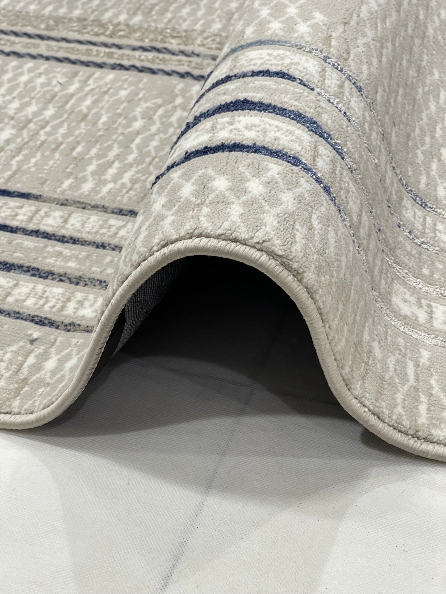 Turkish Polyester Silk.(Article-1612-off white , Blue )
Size : 6.6 ft width x 9.6 ft length ( 200 cm x 290 cm)