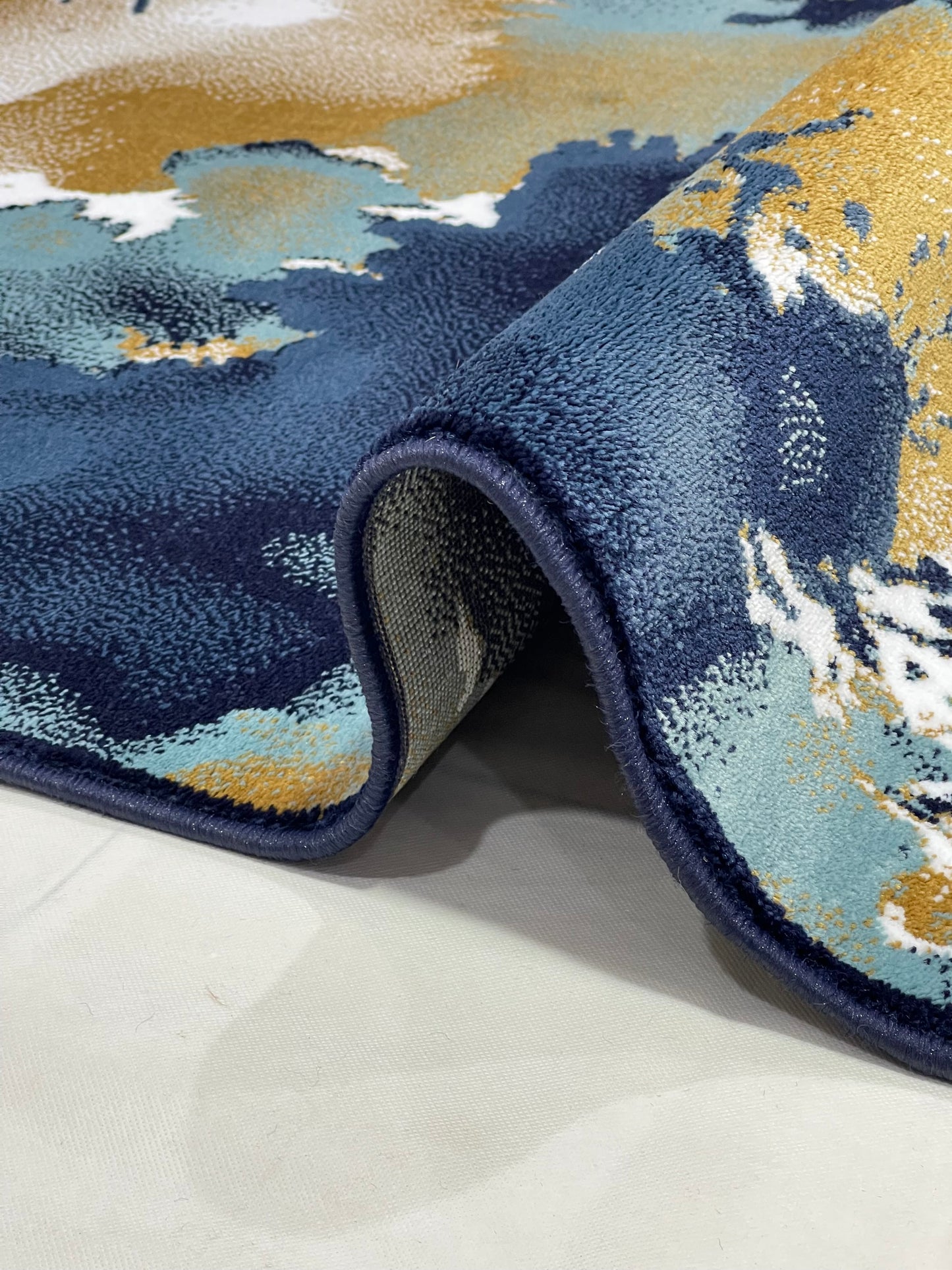 Modern polypropylene Rug,back woven.
(Article-1777-Blue) 
Size : 5 ft width x 7.3 ft length ( 150 cm x 220 cm)