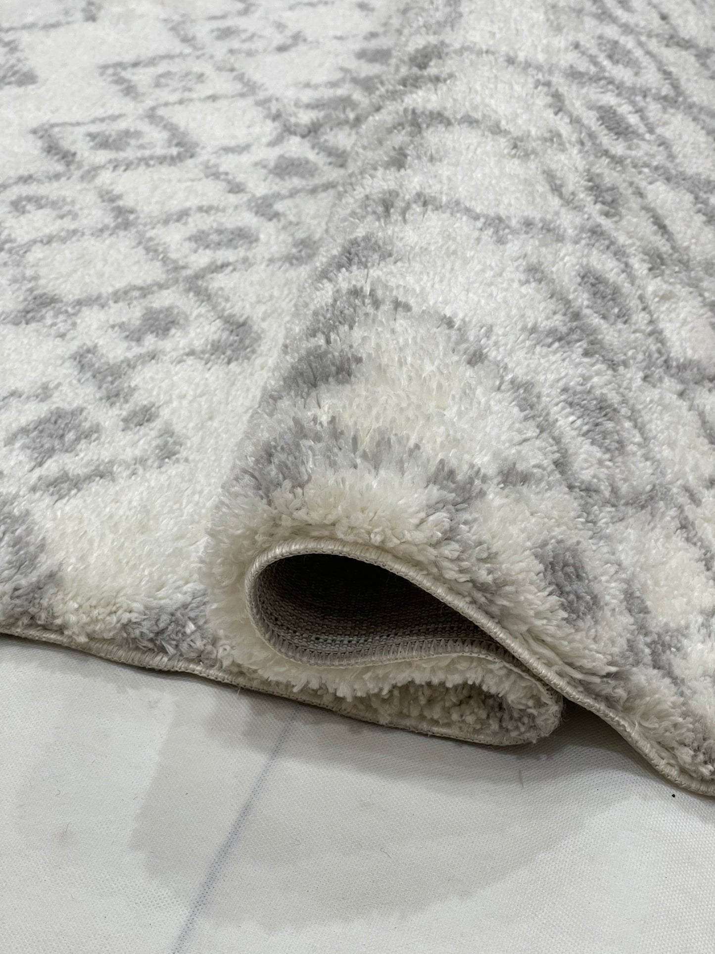 Turkish Shaggy Rug With Woven Back.  Size : 5 Ft Width x 7.3 Ft Length (160cm x 220cm) Article-04-Off White