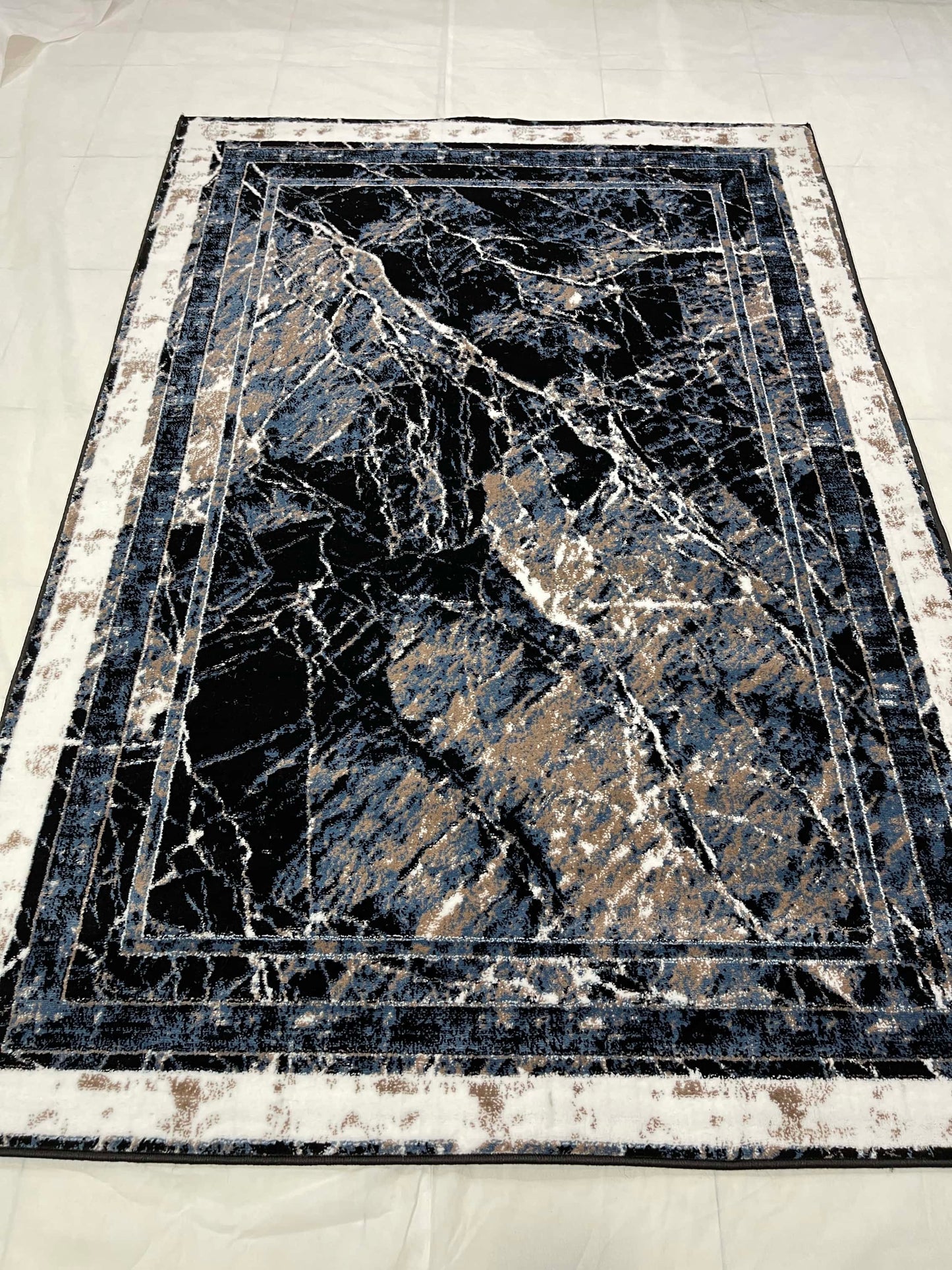 Modern polypropylene Rug,back woven(Article-655-Black,Blue,White)
Size : 5ft width  x 7.3ft length (150cm x 220cm)