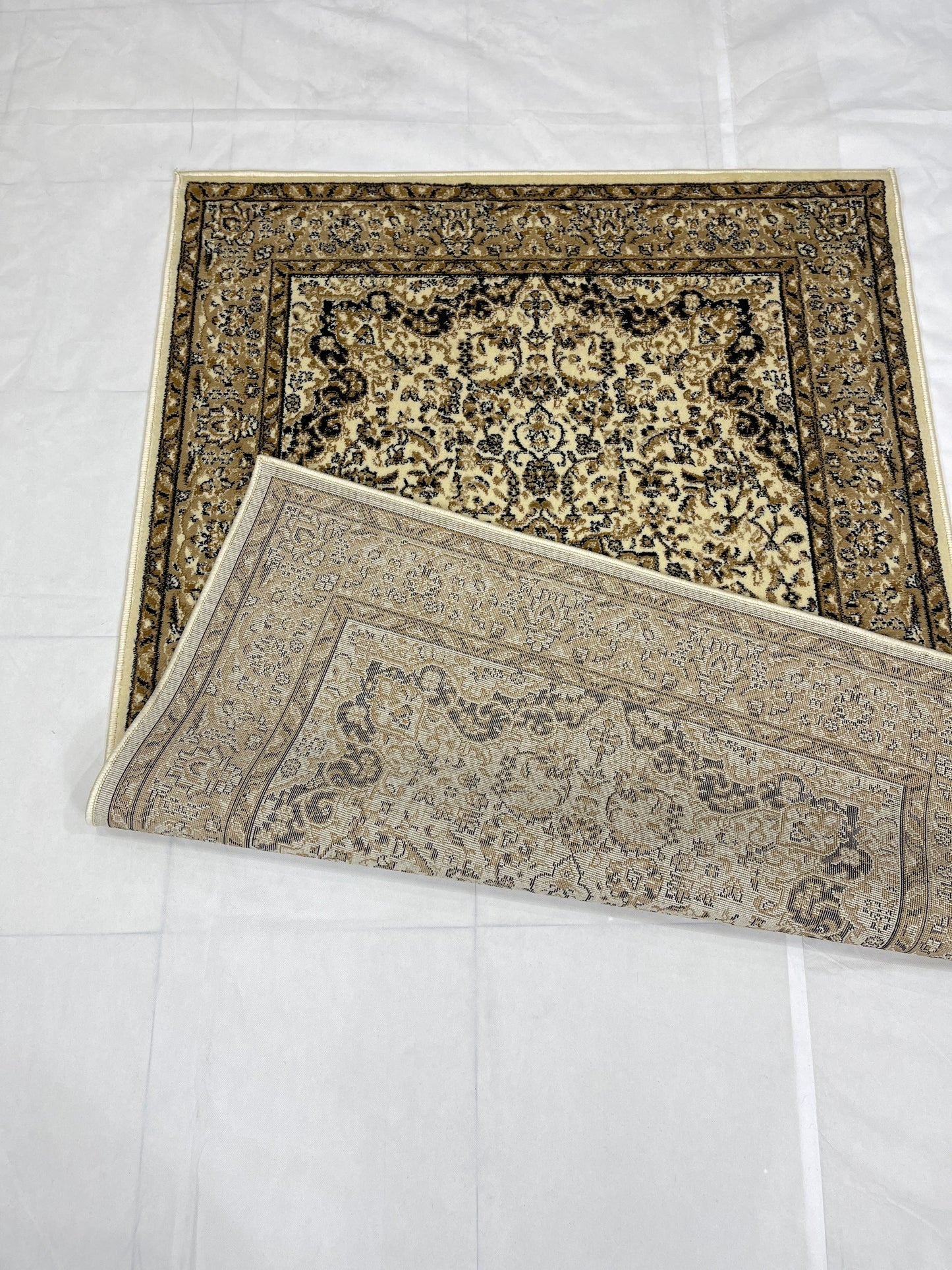 Persian polypropylene Rug,back woven(Article-20-Off white)
Size : 4 ft width x 5.6 ft length (120 cm x 170cm)