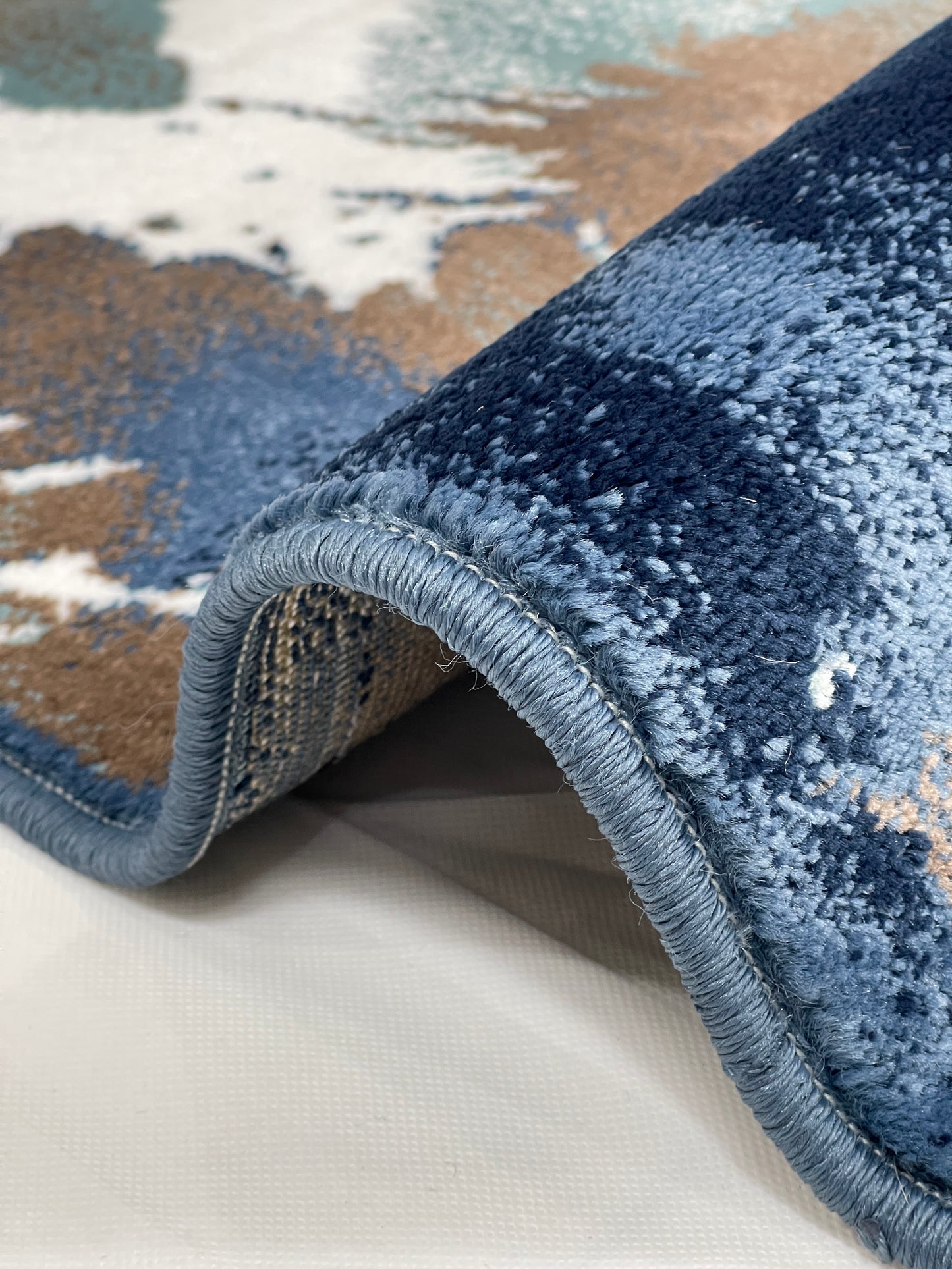 Modern Polypropylene Rug,Woven Back
(Article-69-Blue)
Size : 3 ft width x 5 ft length (100cm x 150 cm)