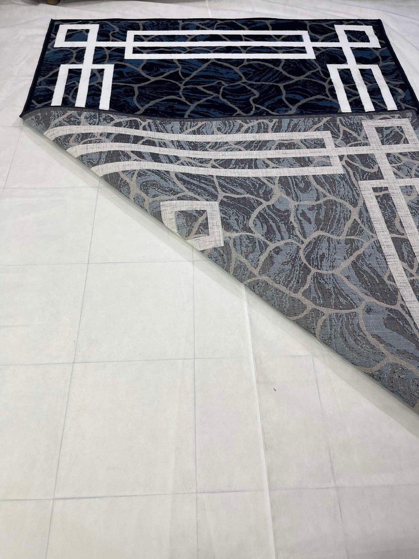 Modern polypropylene Rug,back woven(Article-6668-Blue)
Size : 6.6 ft width x 9.6 ft length (200cm x 290cm)