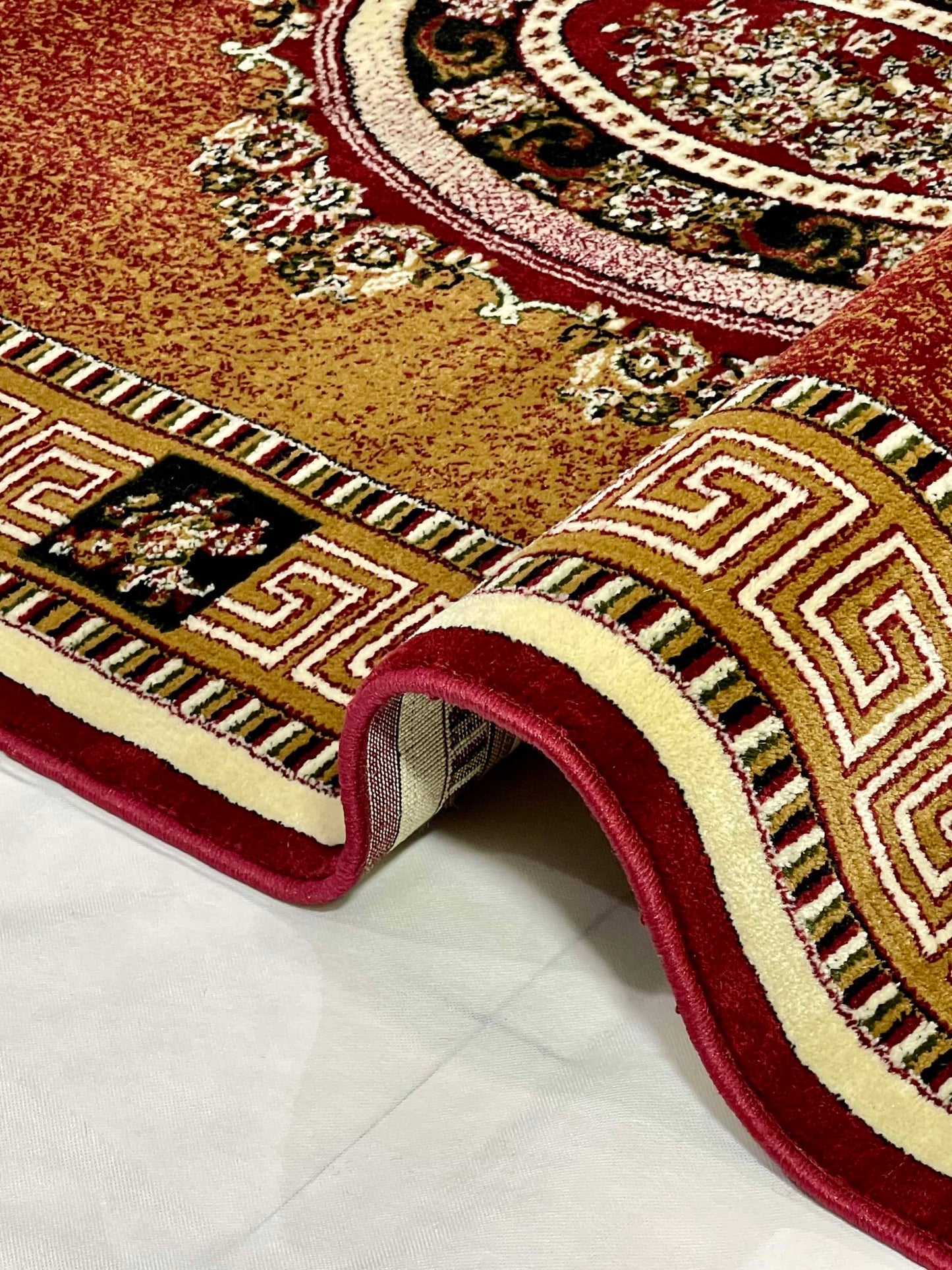 Versace Polypropylene Woven Rug.
Article - 75 - Red