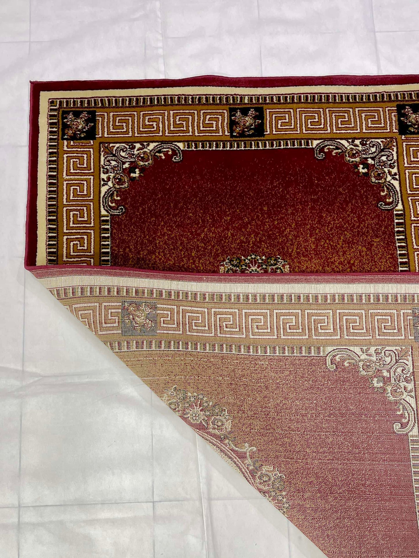 Versace Polypropylene Woven Rug.
Article - 75 - Red