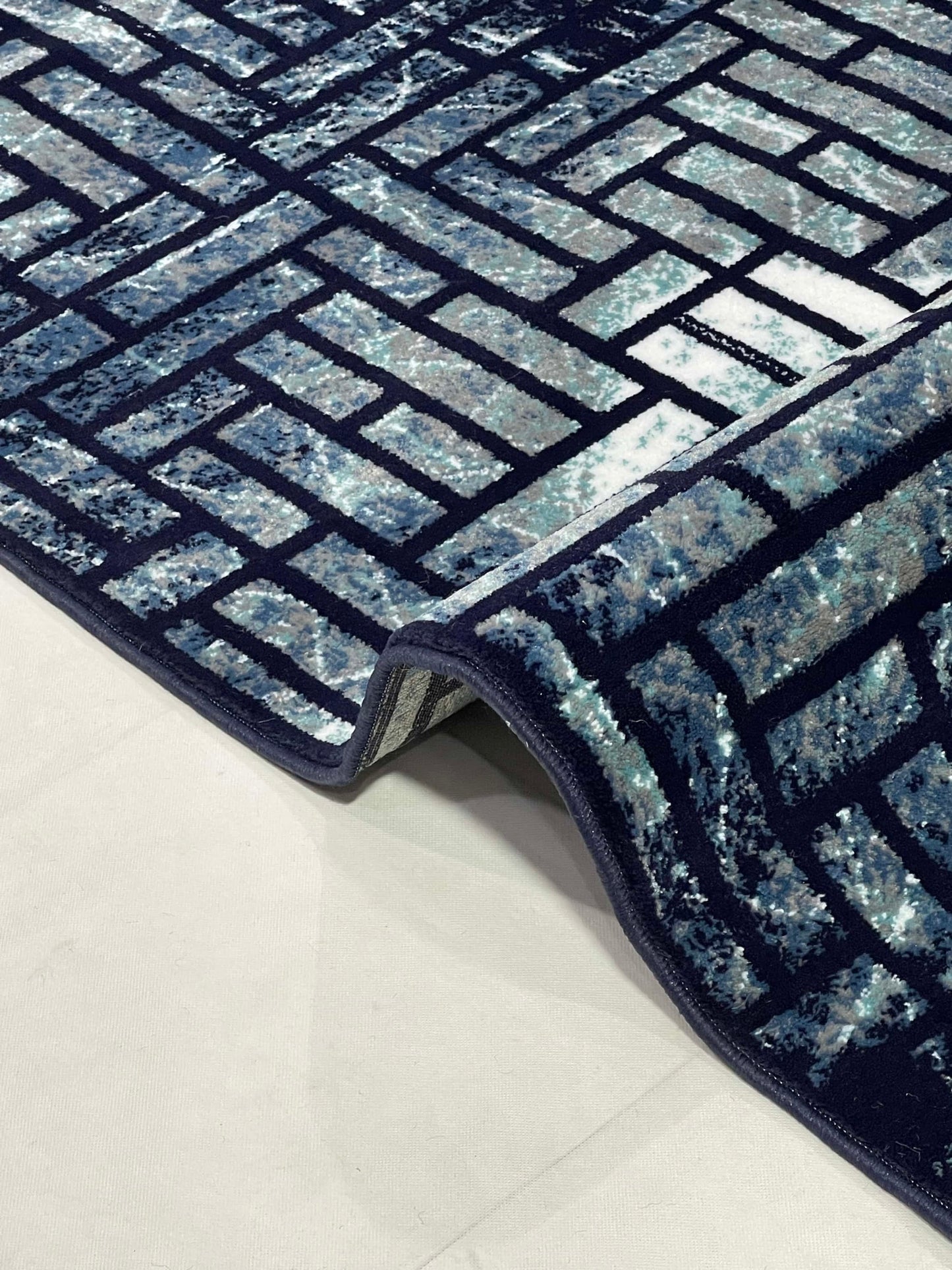 Modern polypropylene Rug,back woven(Article-1160-Blue)
Size : 6.6 ft width x 9.6 ft length (200cm x 290cm)